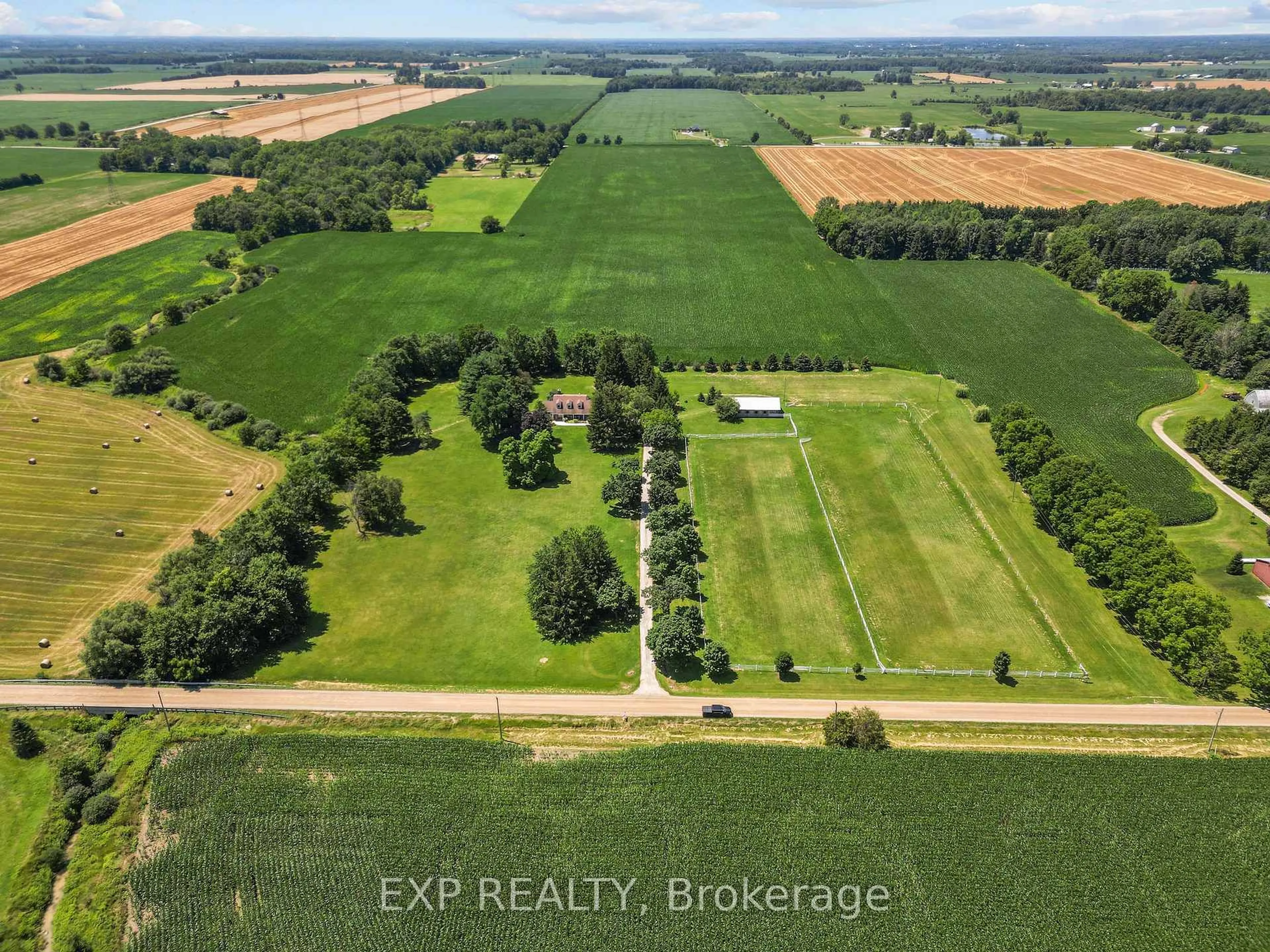 A pic from outside/outdoor area/front of a property/back of a property/a pic from drone, water/lake/river/ocean view for 5855 Cook Rd, Middlesex Centre Ontario N6P 1P3