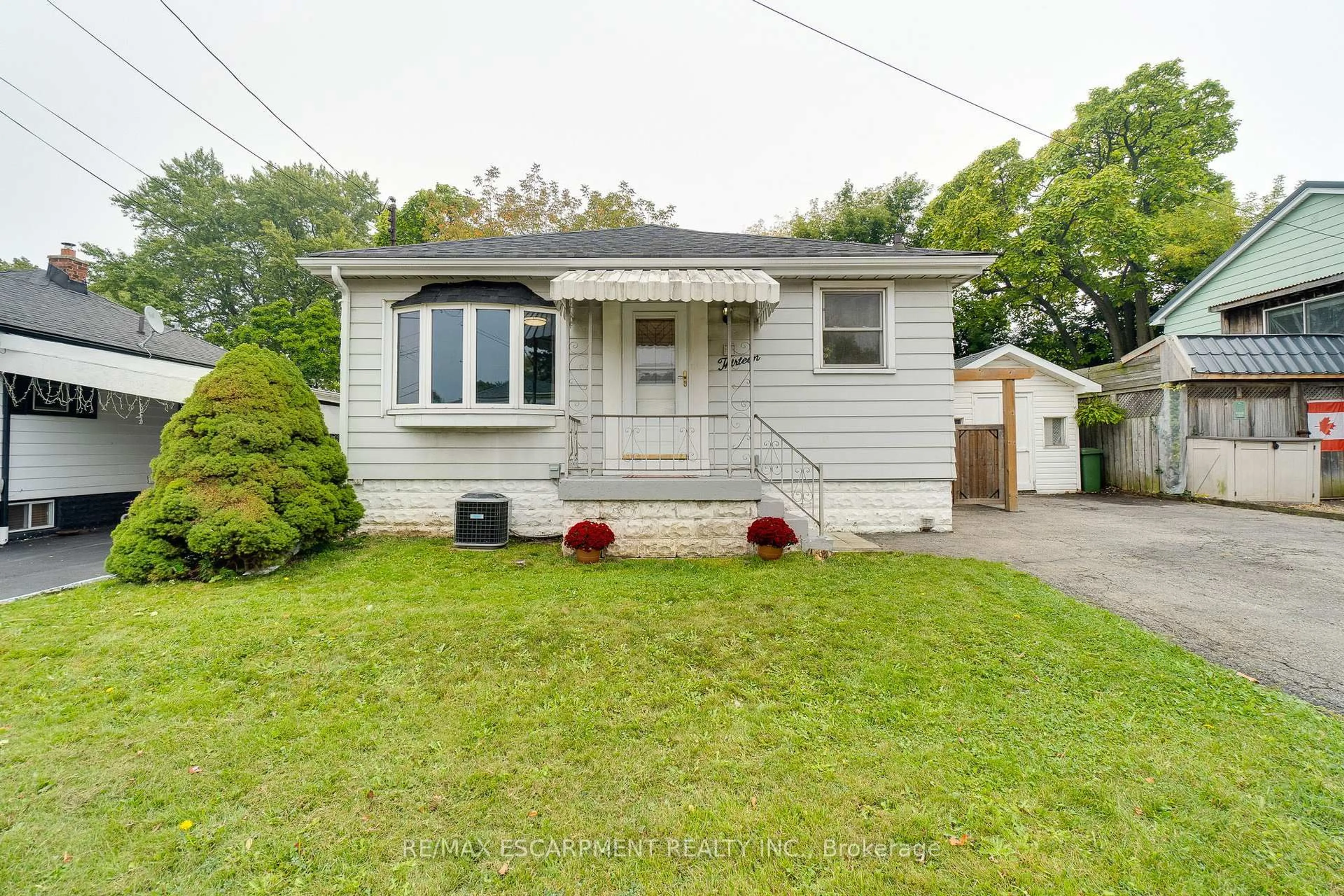 Home with vinyl exterior material, street for 13 David Ave, Hamilton Ontario L9A 3T9