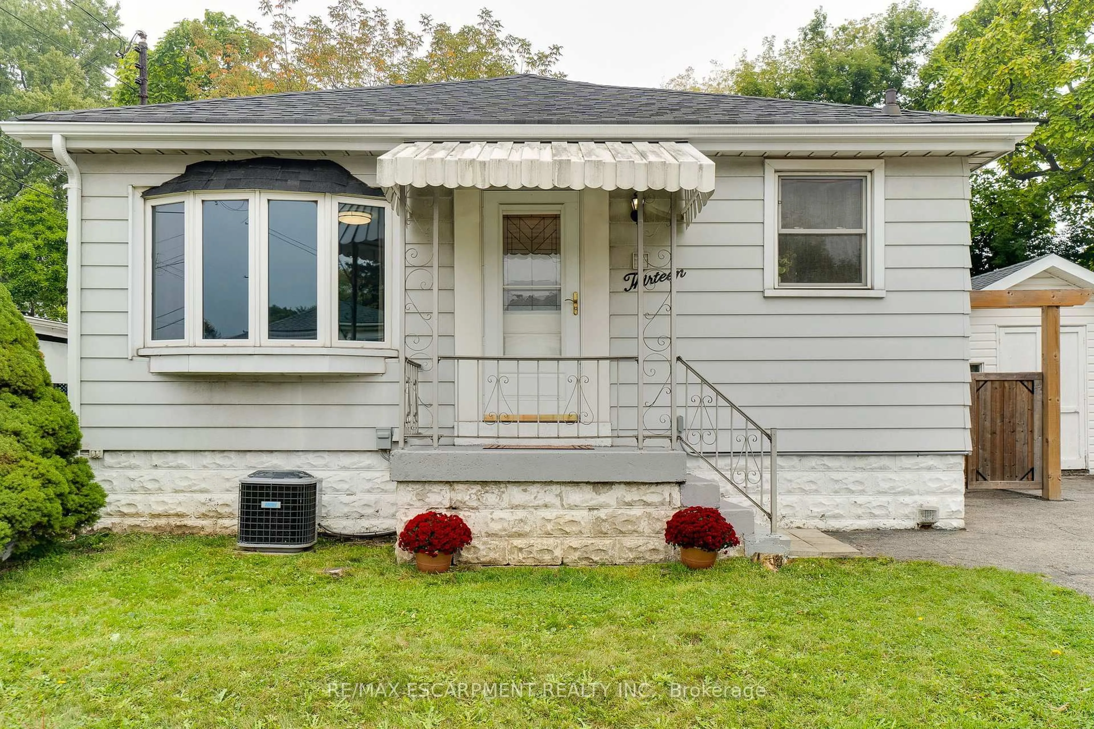 Home with vinyl exterior material, street for 13 David Ave, Hamilton Ontario L9A 3T9