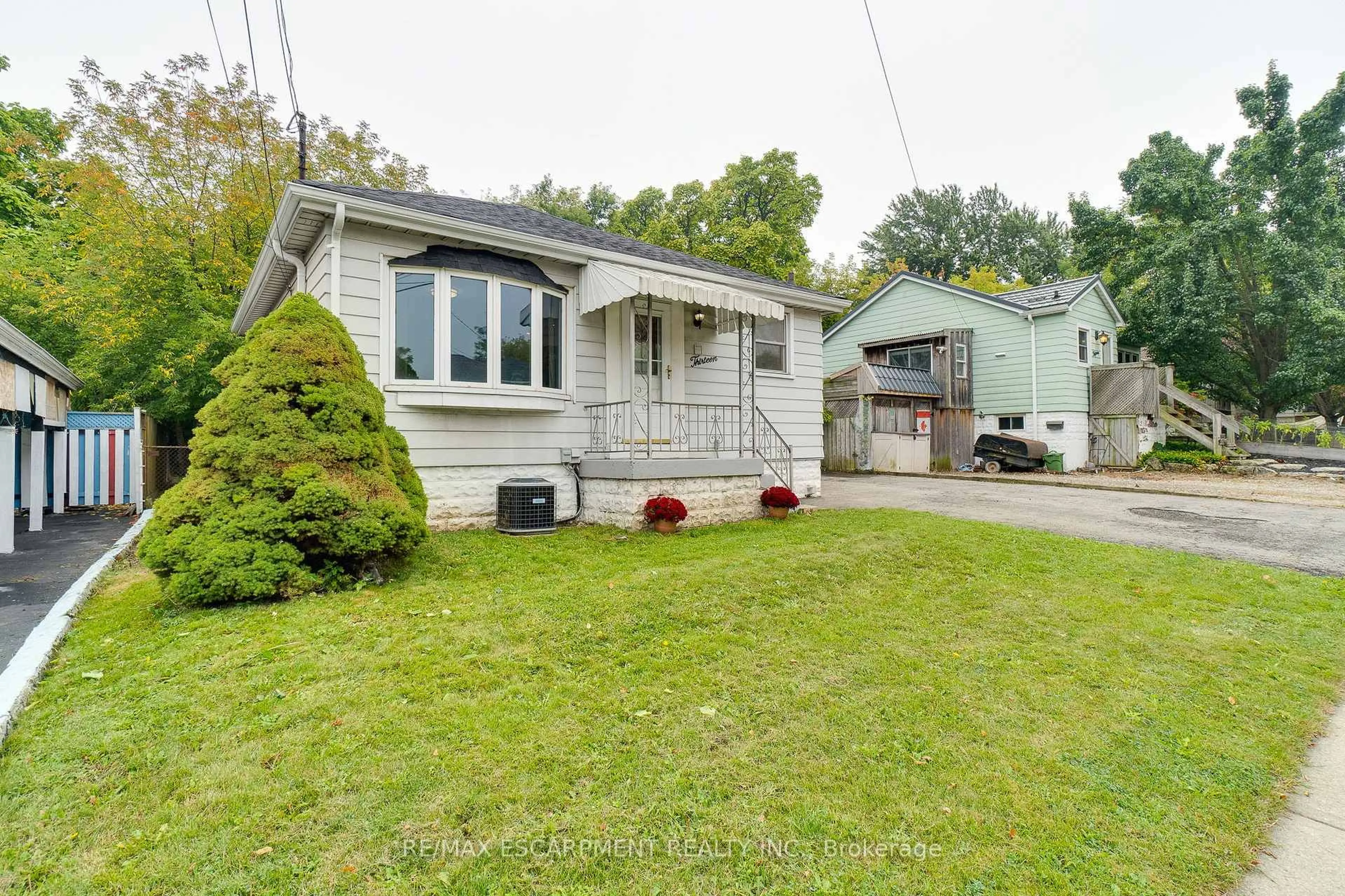 Home with vinyl exterior material, street for 13 David Ave, Hamilton Ontario L9A 3T9