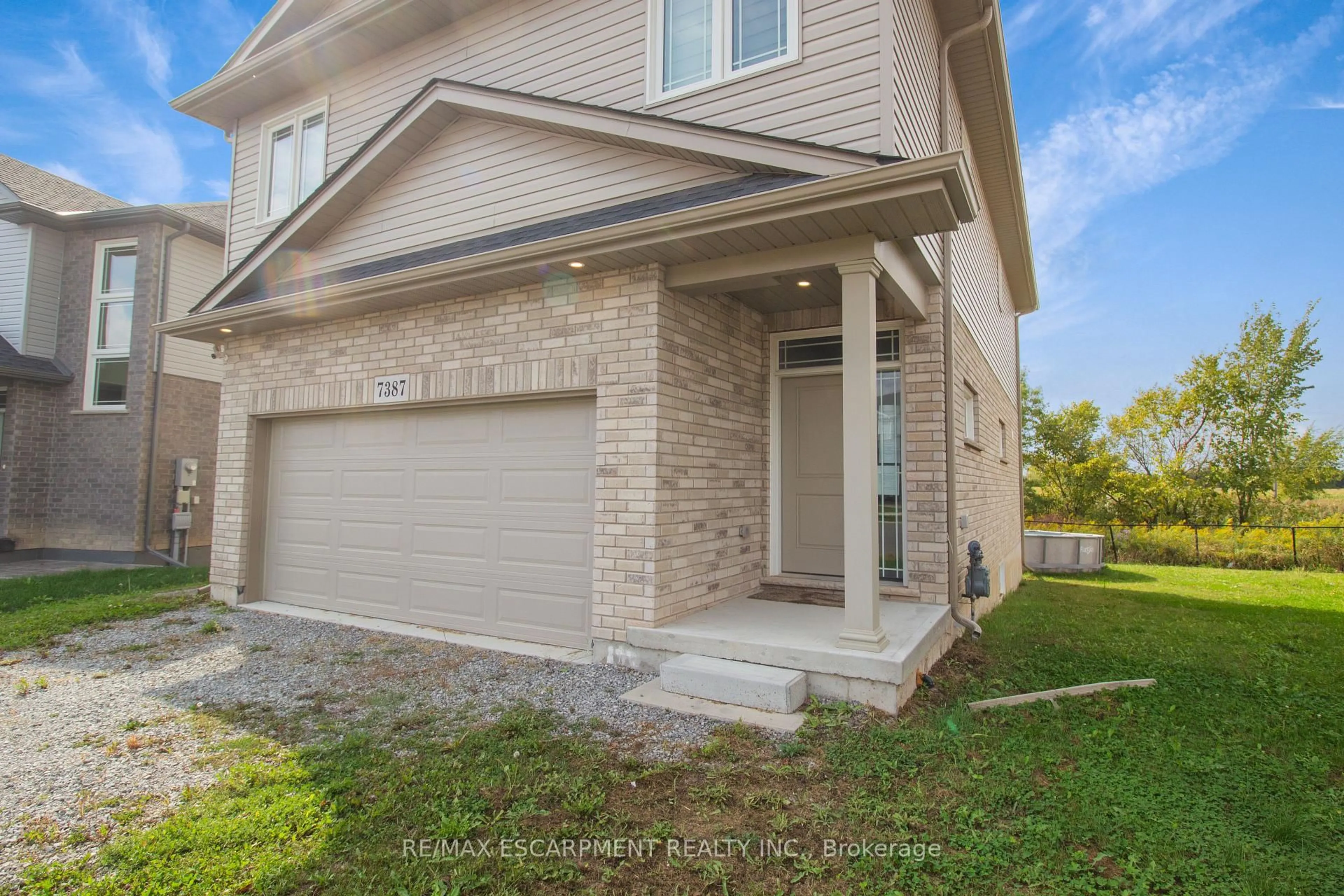 Home with brick exterior material, street for 7387 Sherrilee Cres, Niagara Falls Ontario L2H 3T4