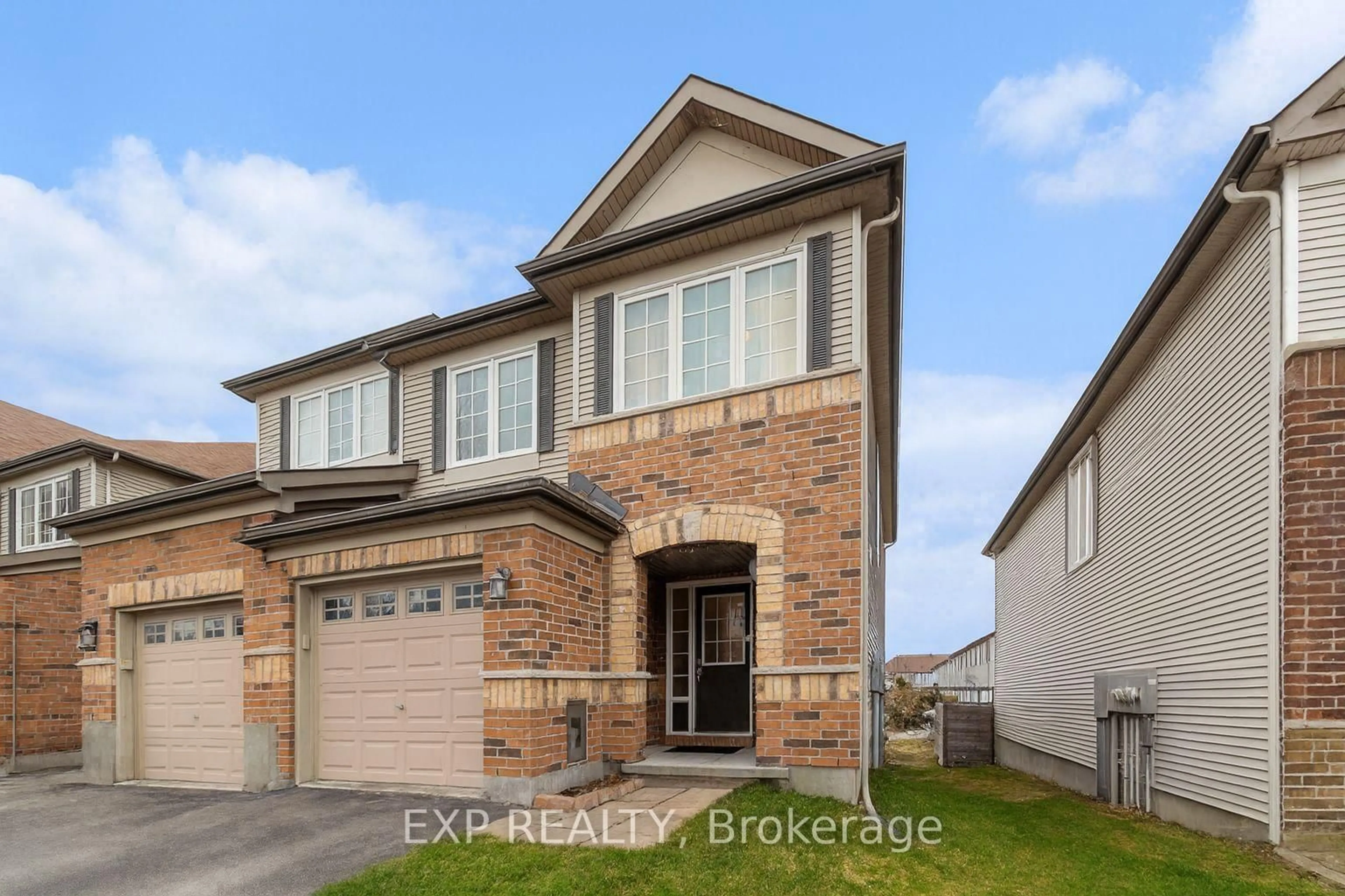 Home with brick exterior material, street for 407 Heathrow Private, Stittsville Ontario K2S 0M9