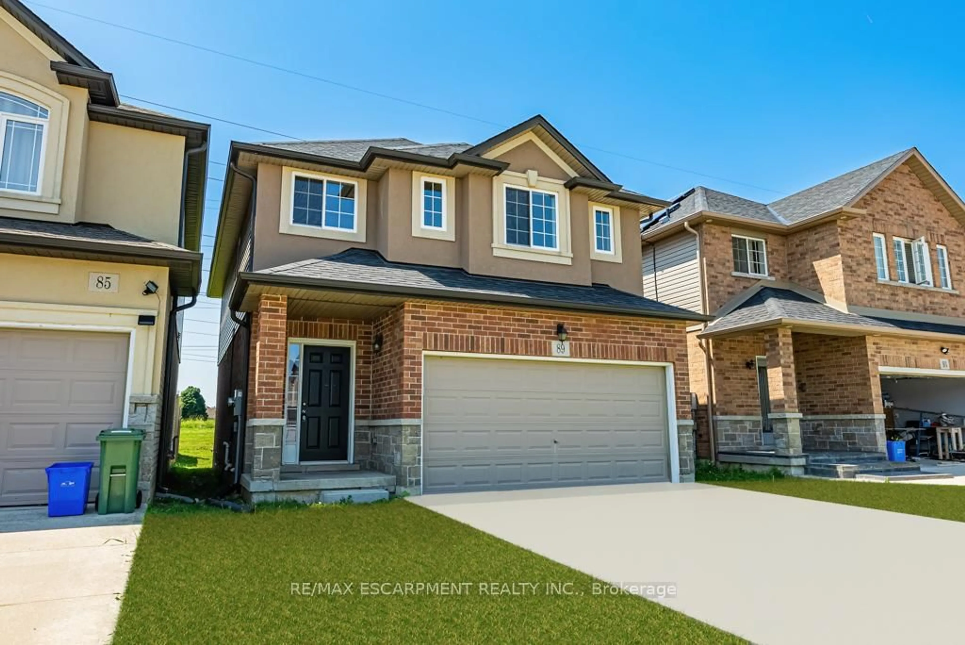 Home with brick exterior material, street for 89 MEDICI Lane, Hamilton Ontario L9B 0G8