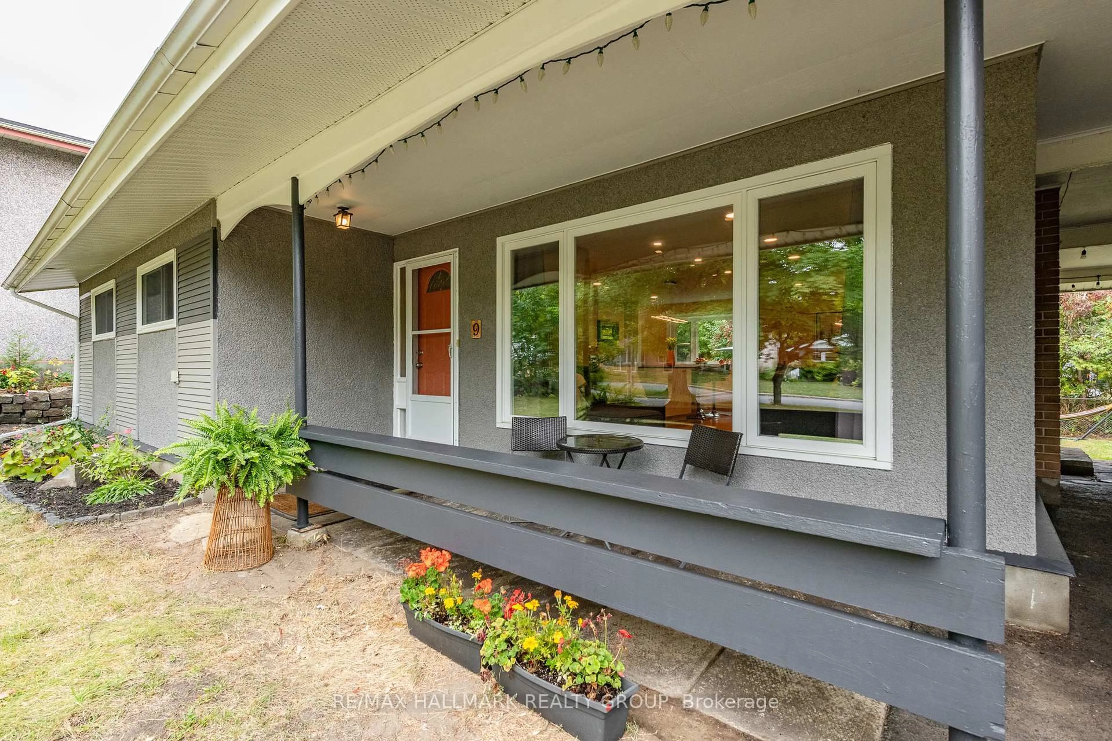Home with vinyl exterior material, street for 9 Newbury Ave, Ottawa Ontario K2E 6K7