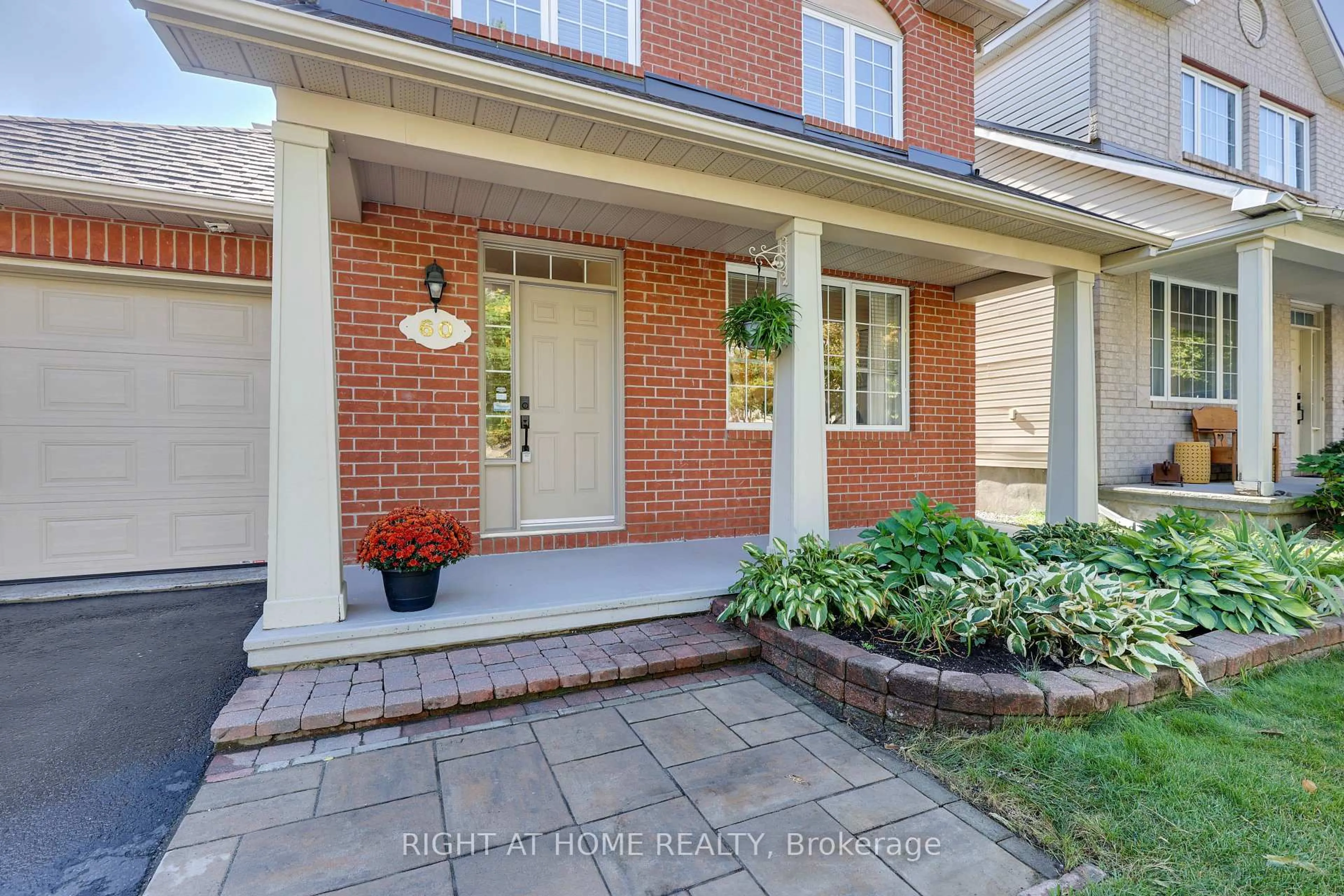 Home with brick exterior material, street for 60 Mersey Dr, Kanata Ontario K2K 3A6