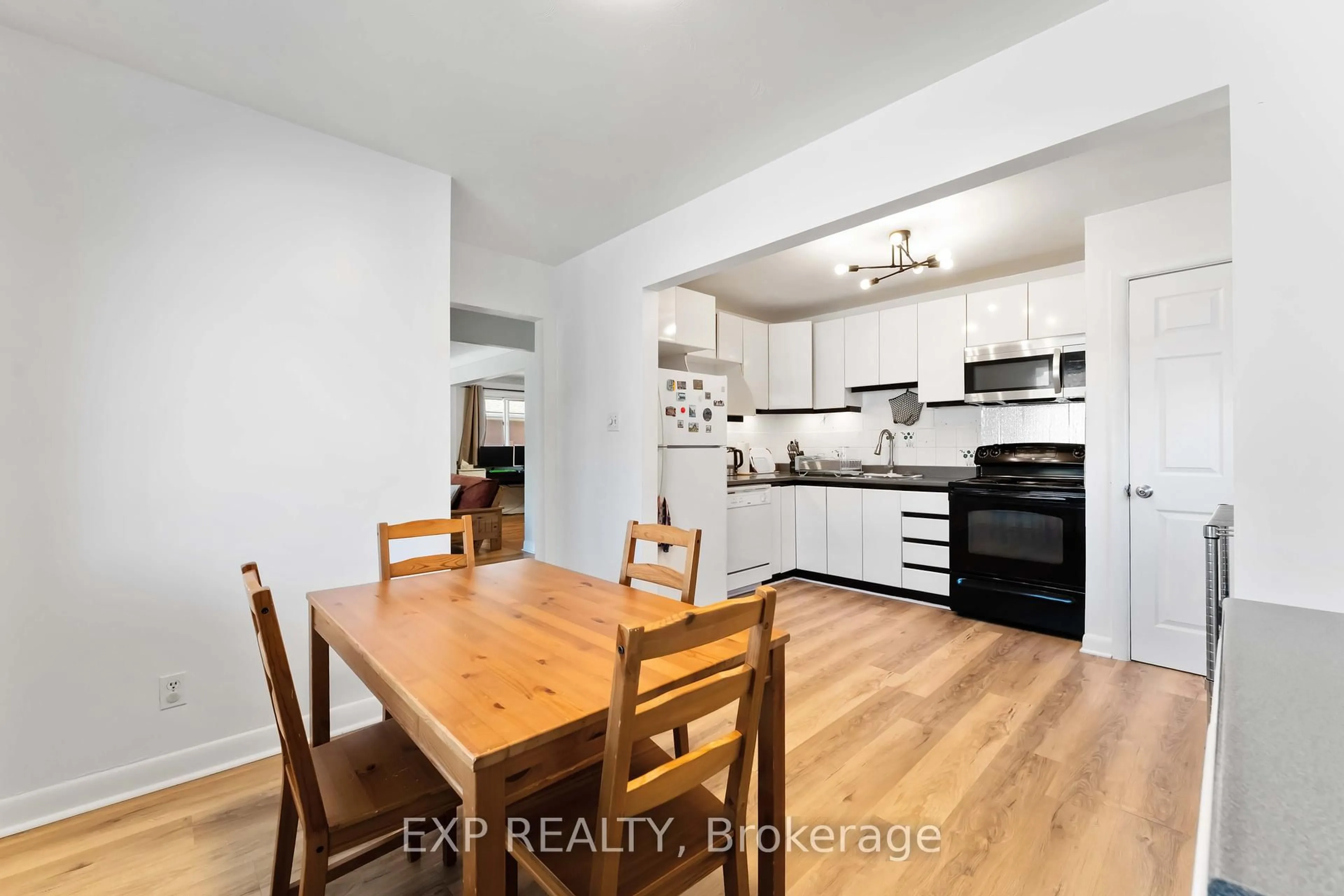 Open concept kitchen, wood/laminate floor for 506 Vernon Ave, Ottawa Ontario K1K 1A6