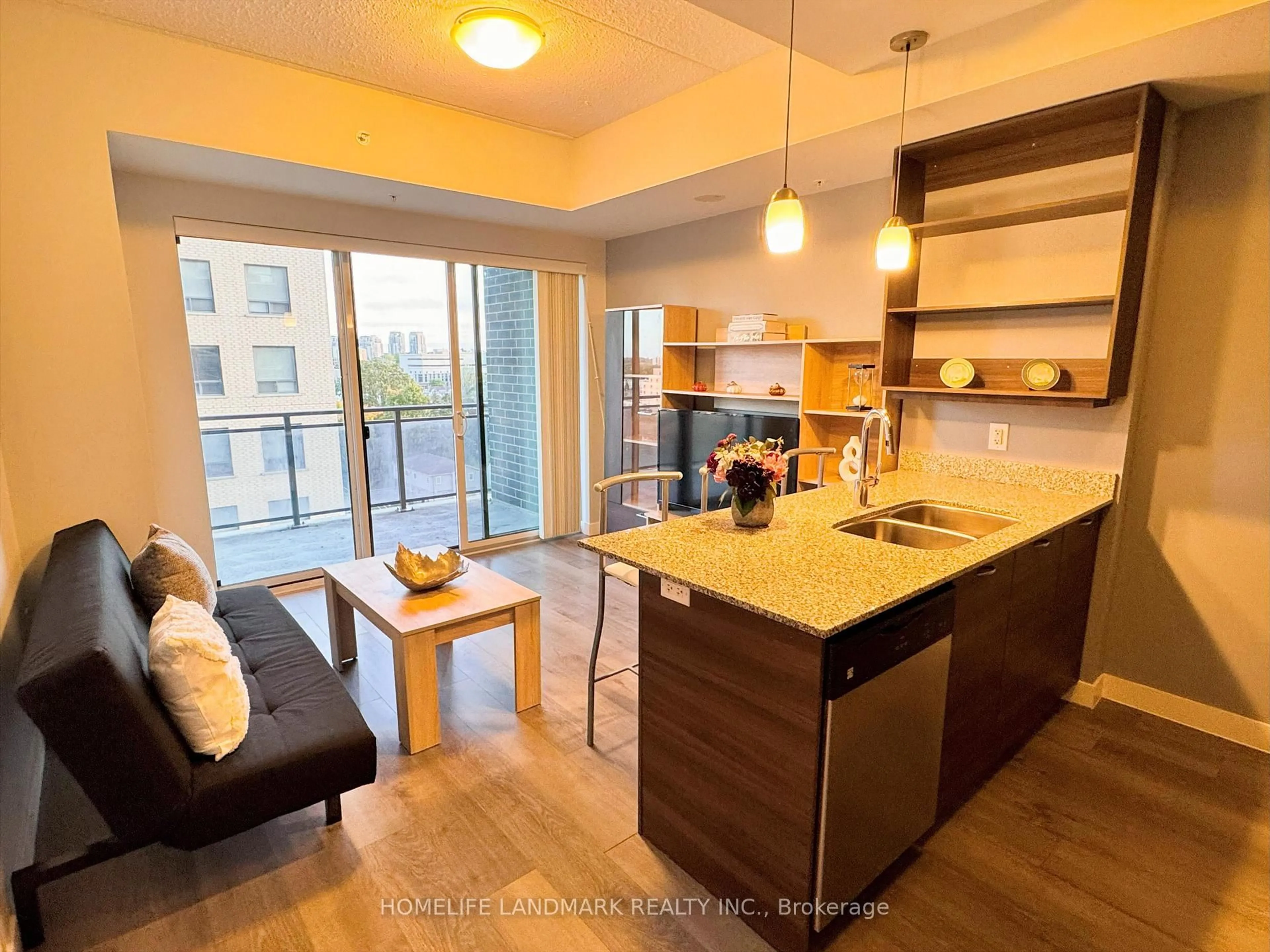 Open concept kitchen, wood/laminate floor for 318 Spruce St #801, Waterloo Ontario N2L 3M7