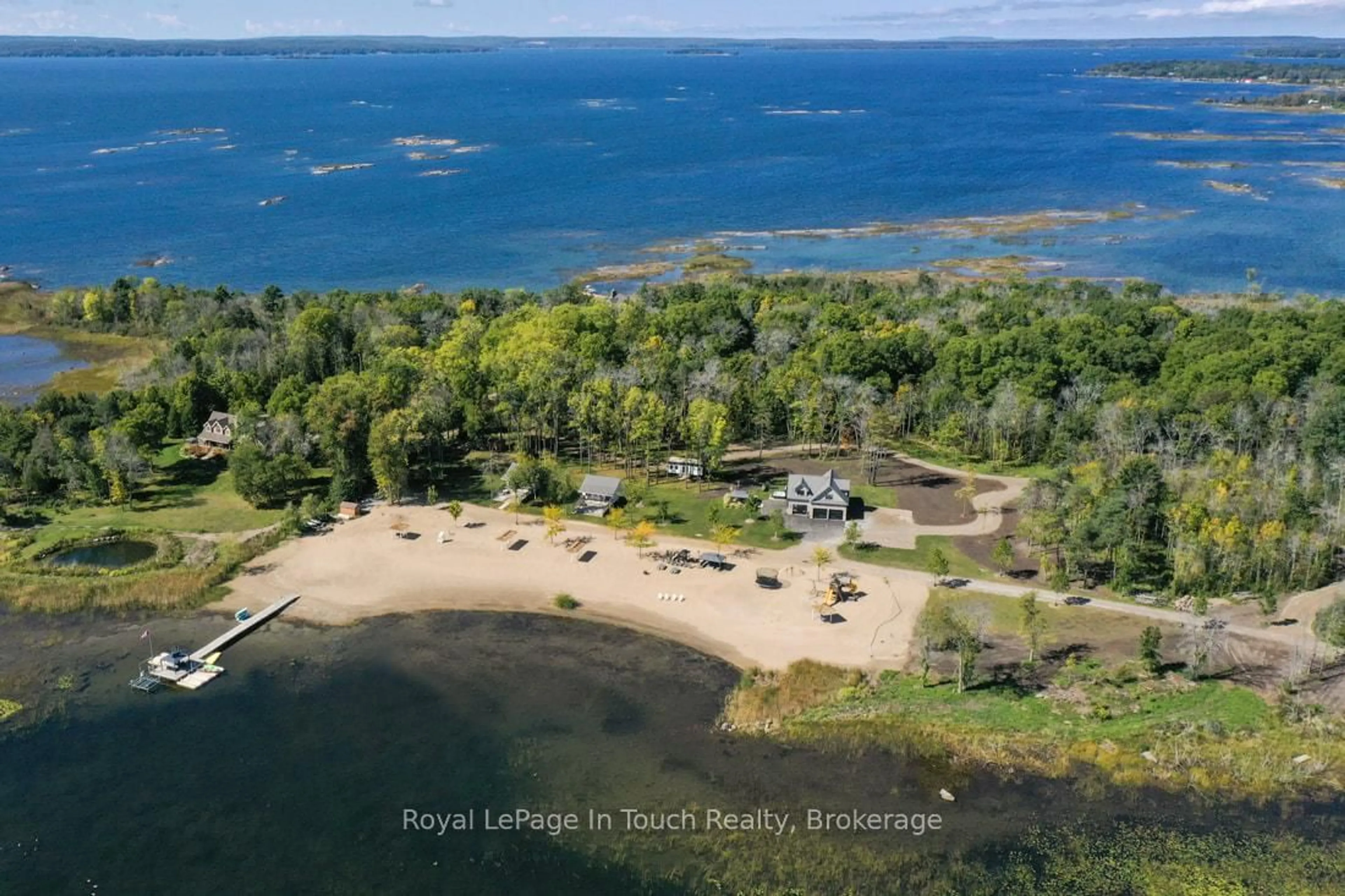 A pic from outside/outdoor area/front of a property/back of a property/a pic from drone, water/lake/river/ocean view for 93-44 Potato Island Rd, Georgian Bay Ontario L0K 1S0