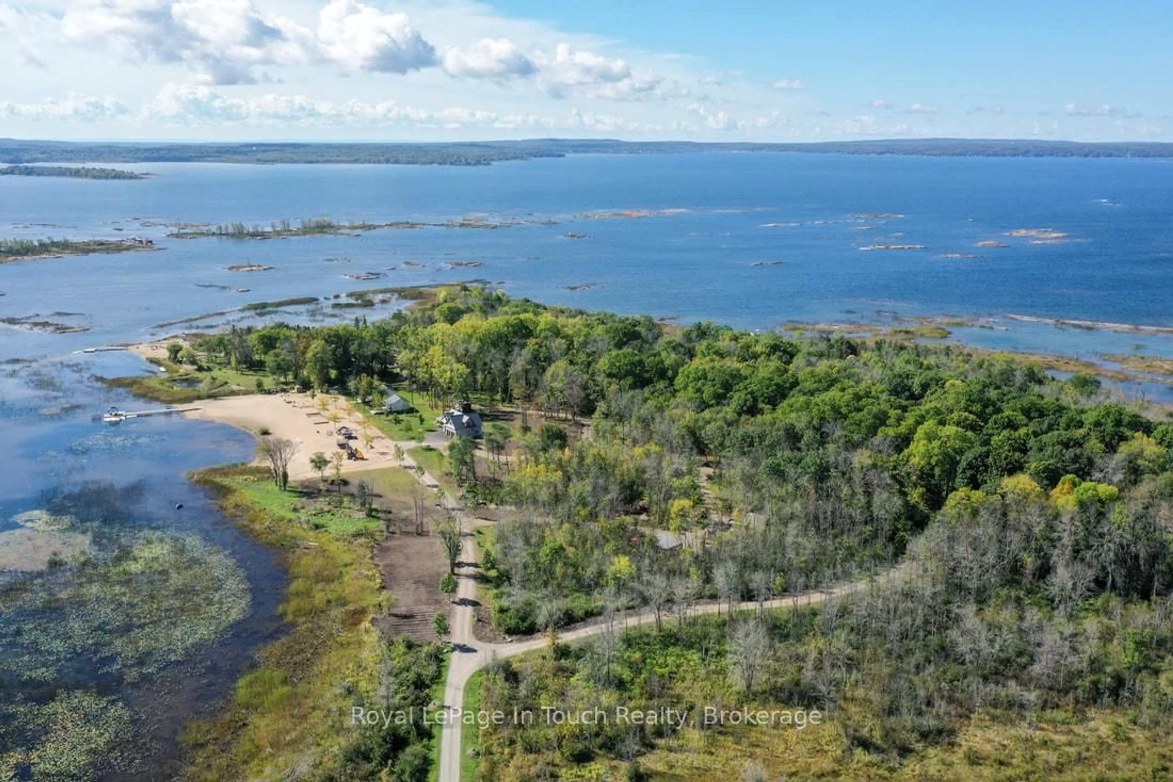 A pic from outside/outdoor area/front of a property/back of a property/a pic from drone, water/lake/river/ocean view for 93-44 Potato Island Rd, Georgian Bay Ontario L0K 1S0