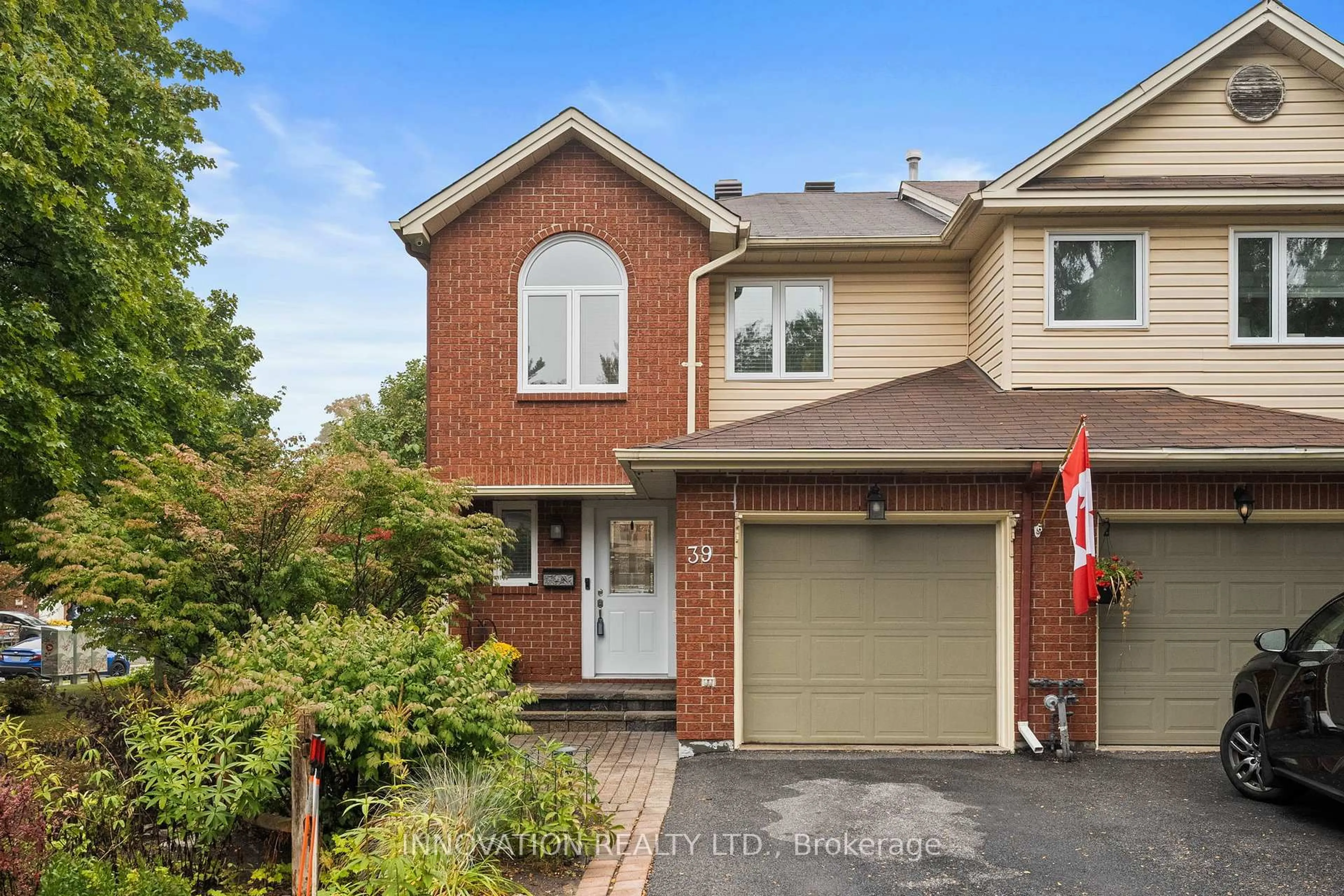 Home with brick exterior material, street for 39 Furlong Cres, Ottawa Ontario K2M 2J1