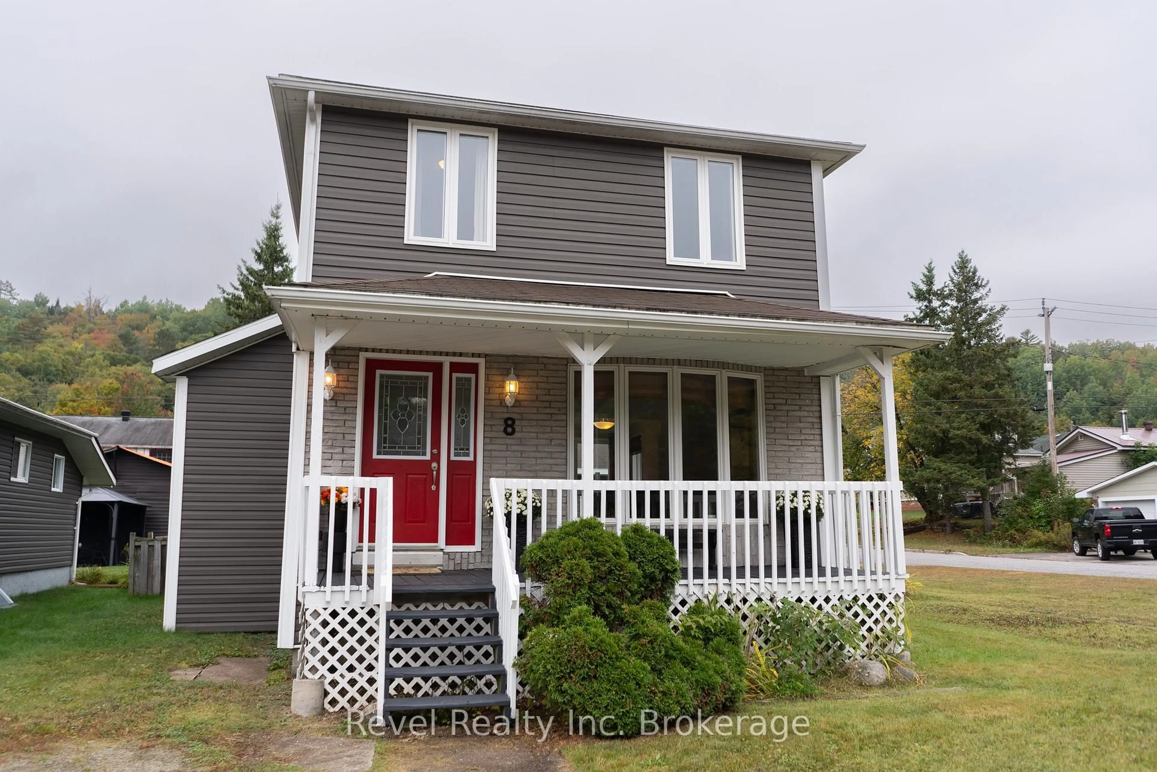 Home with vinyl exterior material, street for 8 Pine St, Unorganized Townships Ontario P0H 2J0