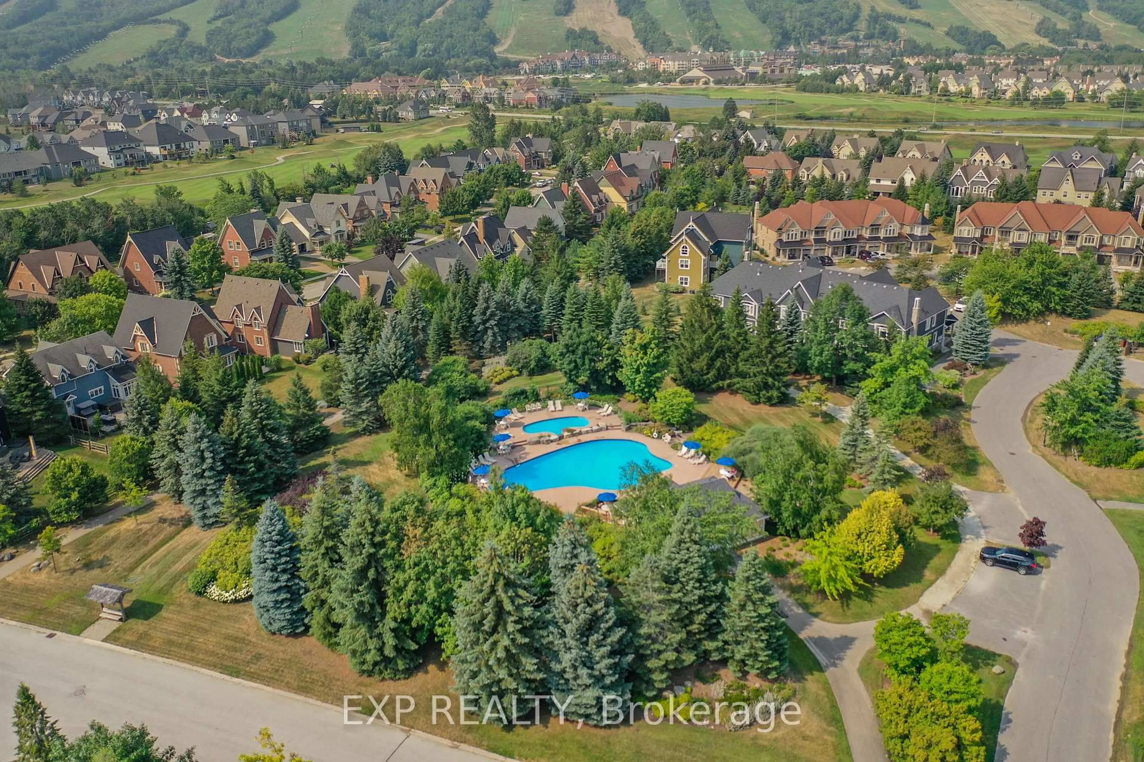 A pic from outside/outdoor area/front of a property/back of a property/a pic from drone, water/lake/river/ocean view for 170 Snowbridge Way #222, Blue Mountains Ontario L9Y 0V1