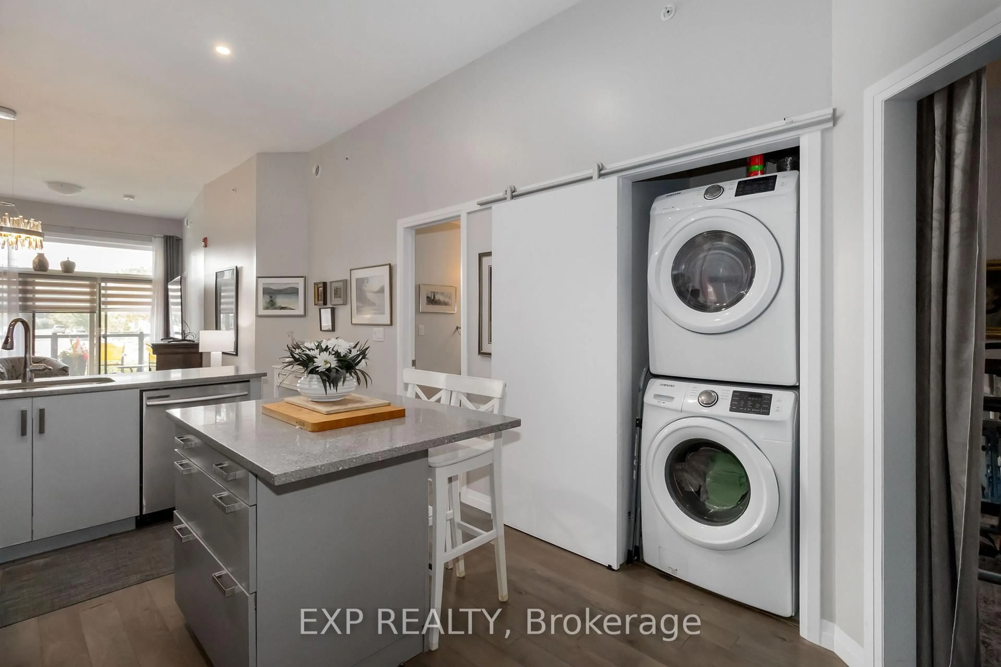 Kitchen with laundary machines, unknown for 85 Morrell St #105A, Brant Ontario N3T 4J6