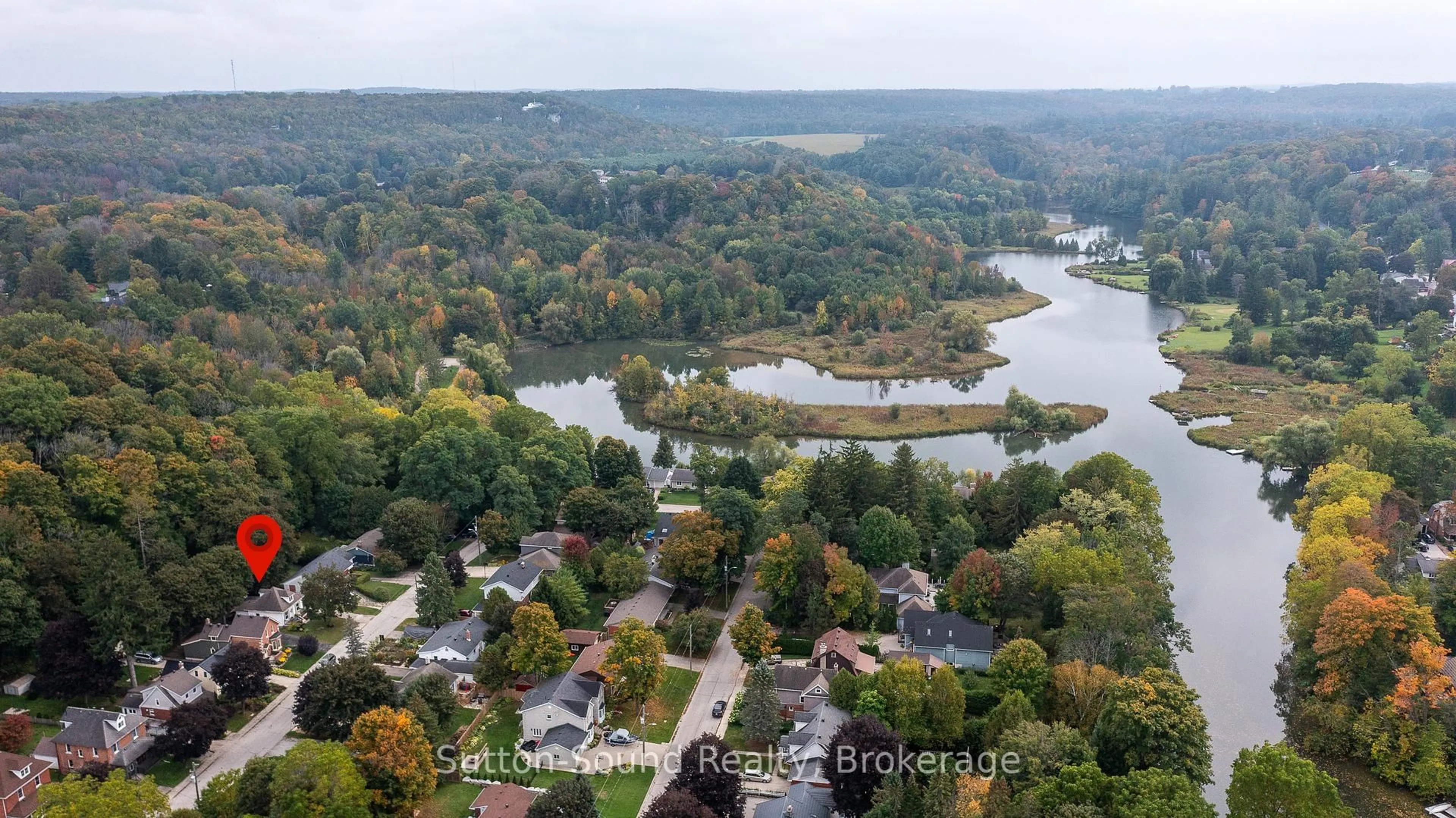 A pic from outside/outdoor area/front of a property/back of a property/a pic from drone, water/lake/river/ocean view for 449 5th Ave, Owen Sound Ontario N4K 2R4