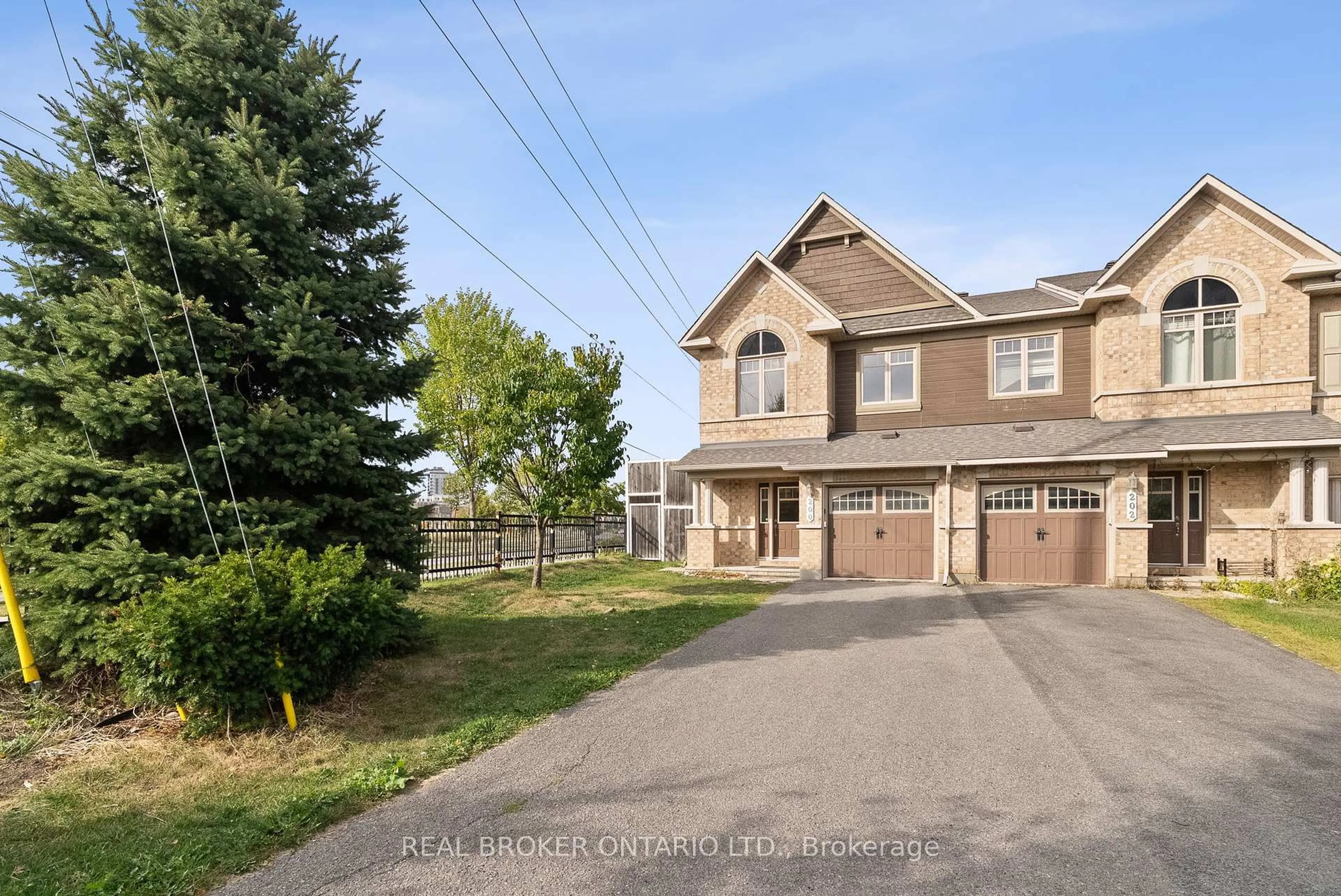 A pic from outside/outdoor area/front of a property/back of a property/a pic from drone, street for 200 Garrity Cres, Ottawa Ontario K2J 3T7