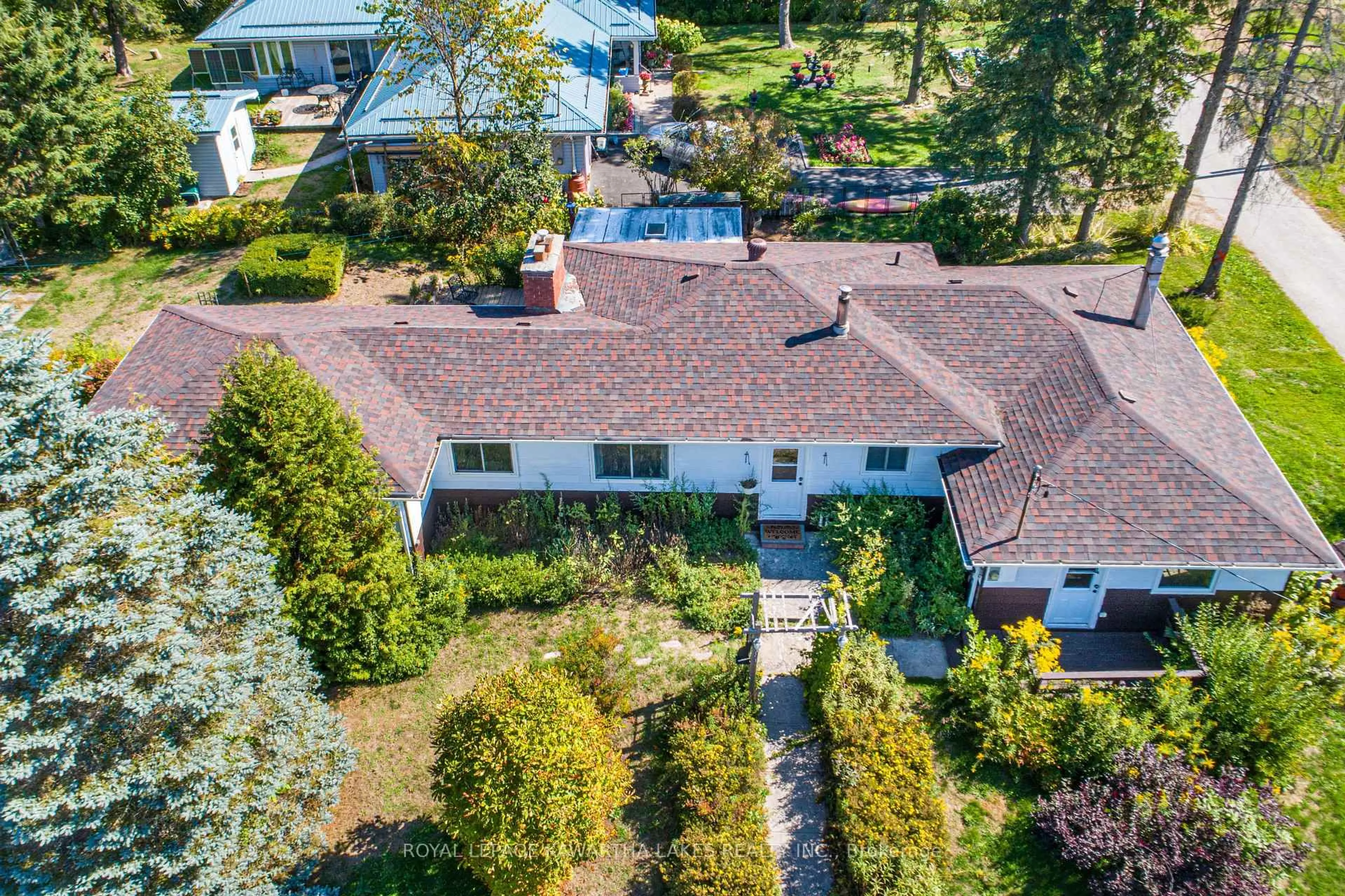 A pic from outside/outdoor area/front of a property/back of a property/a pic from drone, street for 85 Thomas Dr, Kawartha Lakes Ontario K0M 1N0