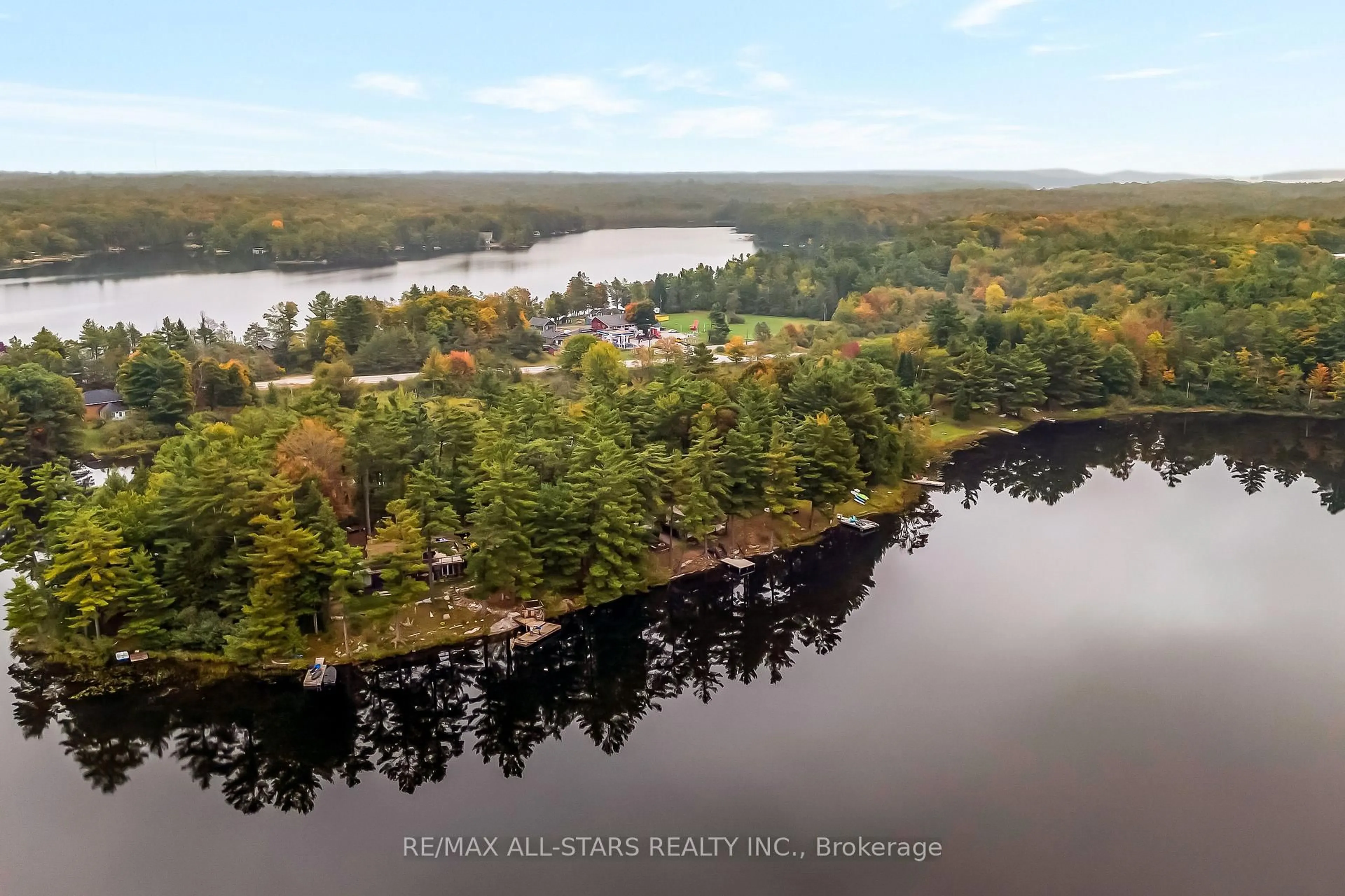 A pic from outside/outdoor area/front of a property/back of a property/a pic from drone, water/lake/river/ocean view for 1006 Youngs Rd #Cottage #9, Muskoka Lakes Ontario P0B 1J0