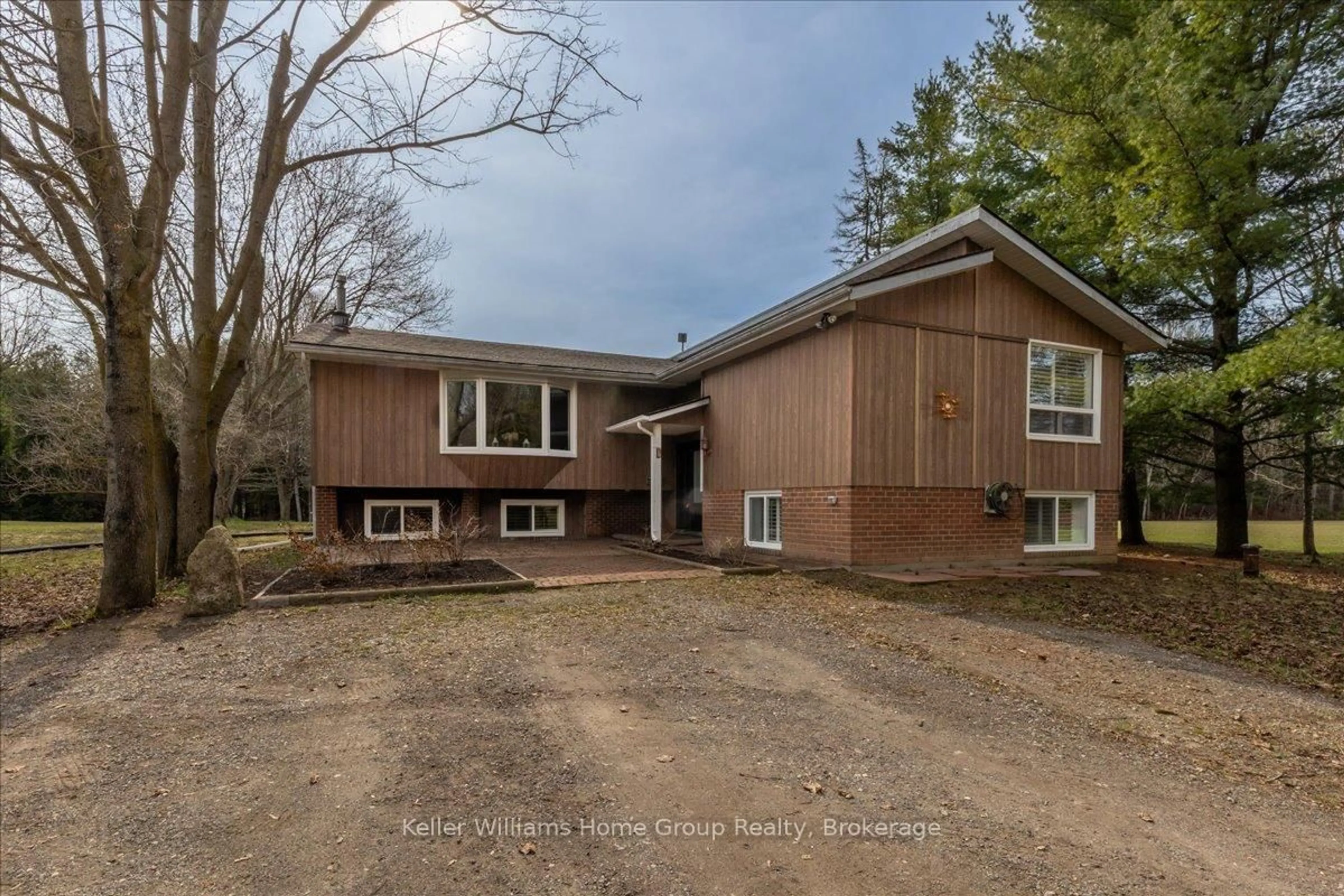Home with brick exterior material, street for 121012 Dufferin Road 5, East Garafraxa Ontario L9W 6Z2