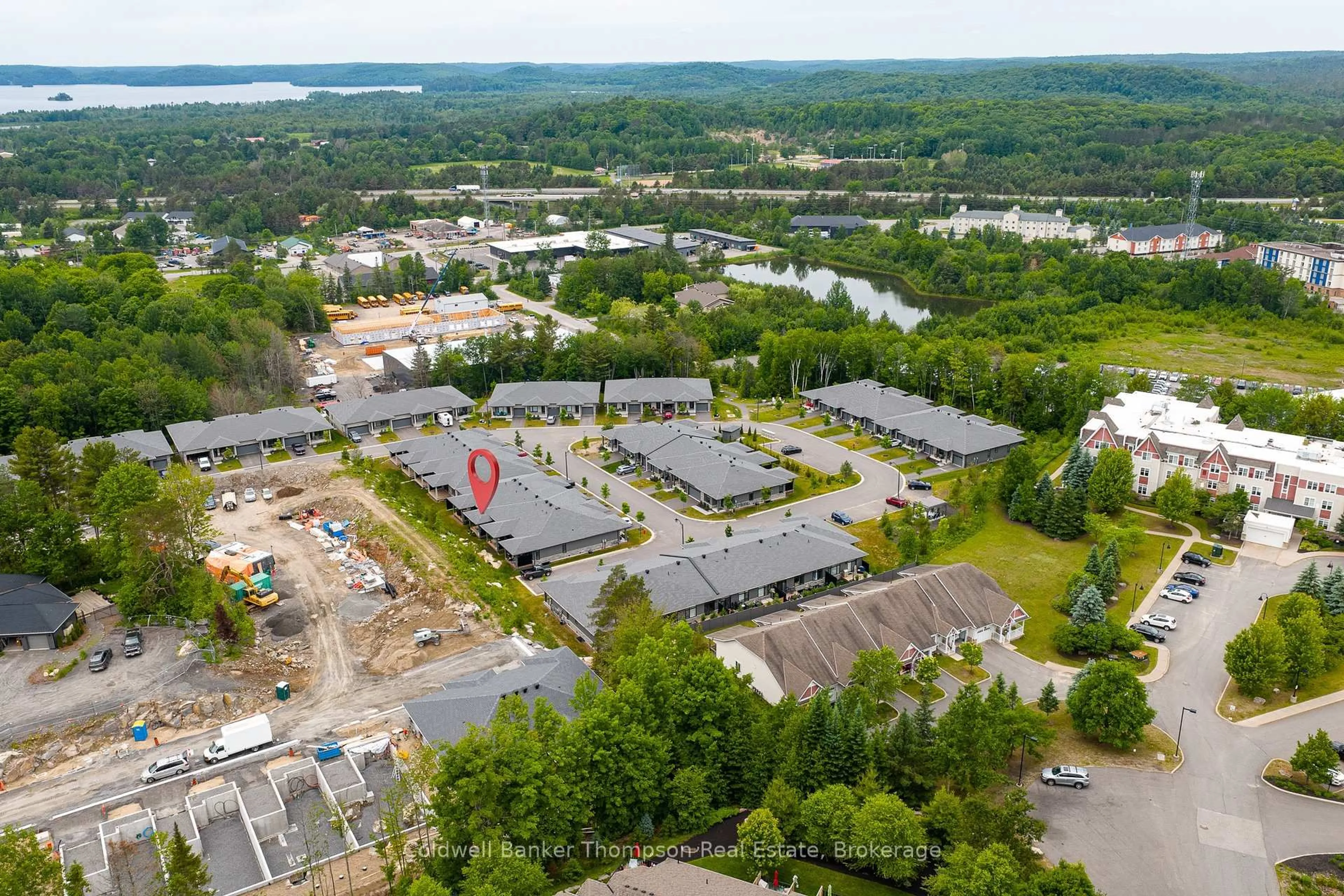 A pic from outside/outdoor area/front of a property/back of a property/a pic from drone, water/lake/river/ocean view for 12 Blue Birch Lane, Huntsville Ontario P1H 0G4