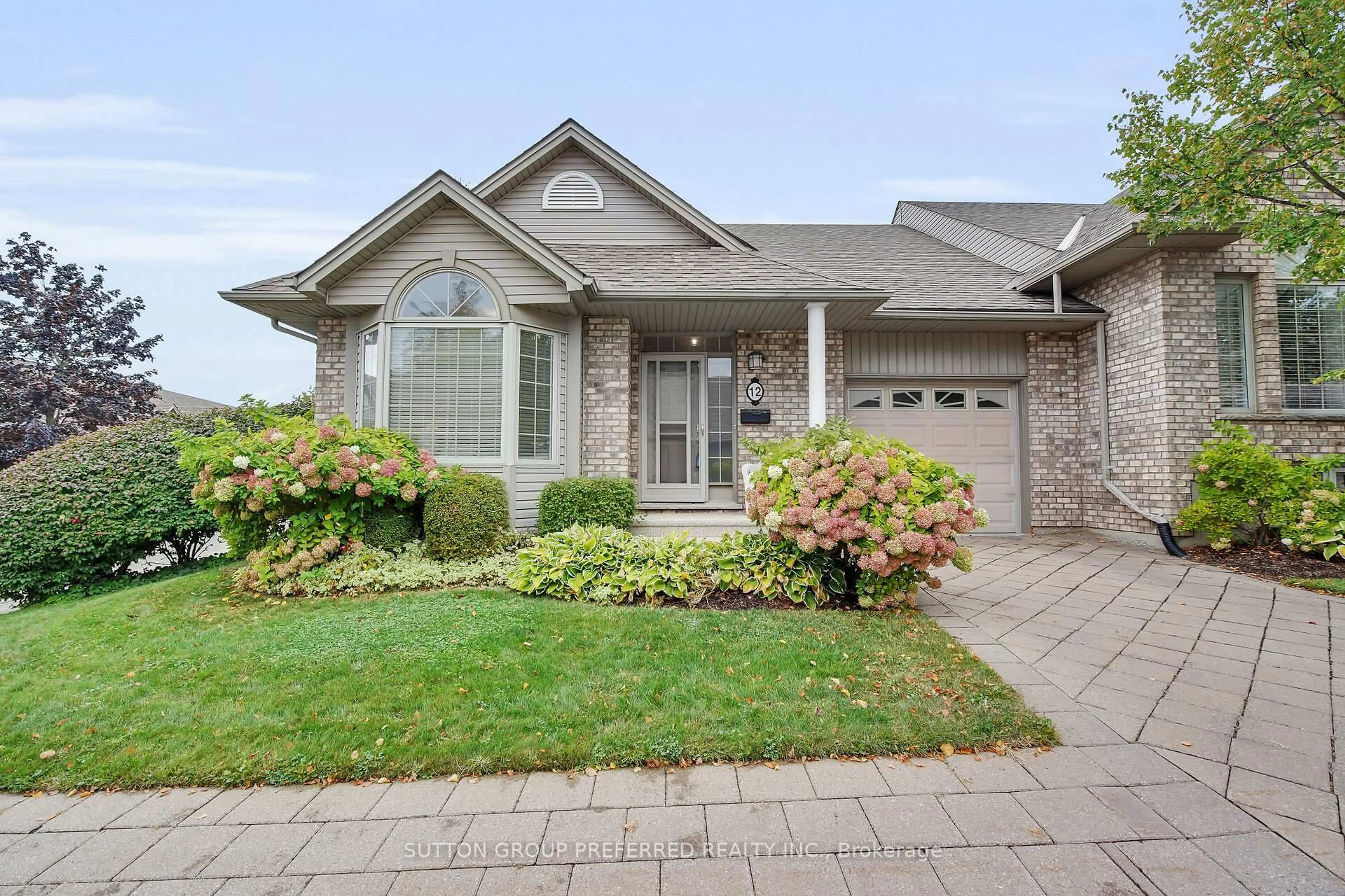 Home with brick exterior material, street for 800 Commissioners Rd #12, London South Ontario N6K 1C2