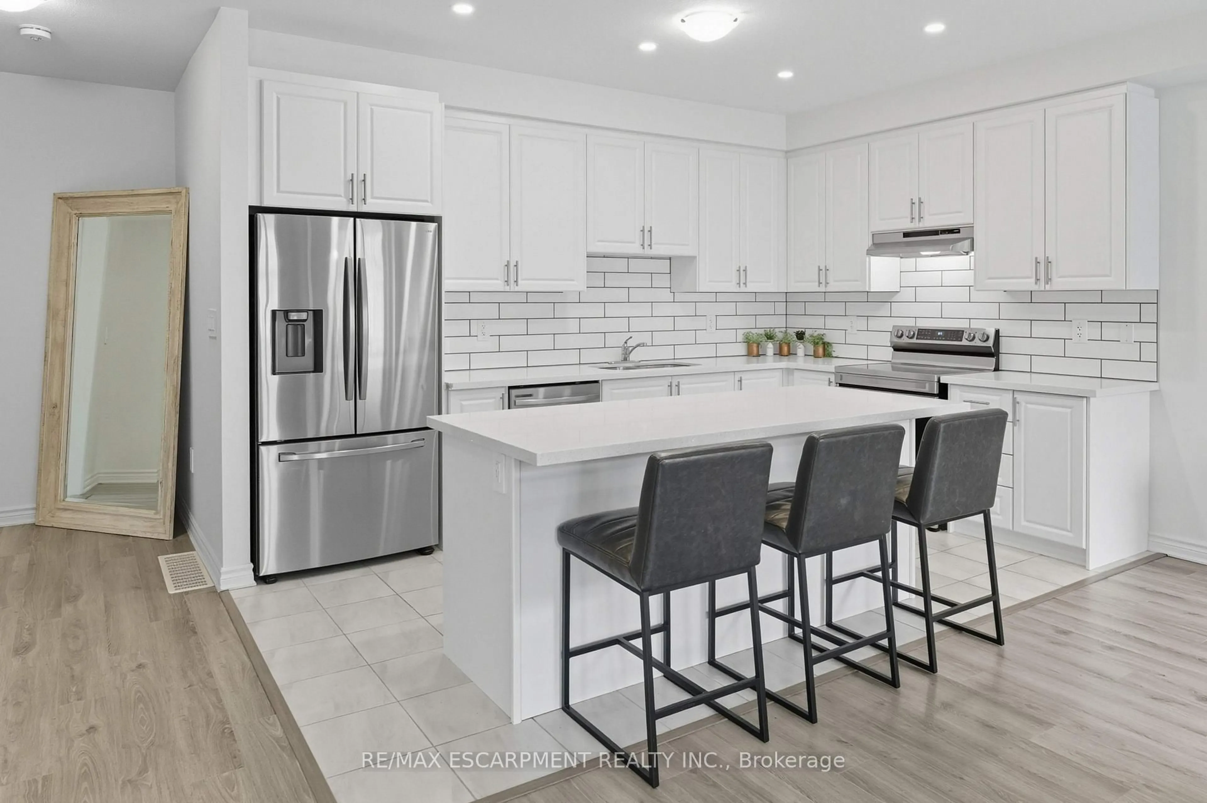 Open concept kitchen, ceramic/tile floor for 10 Beretta St, Tillsonburg Ontario N4G 0J7