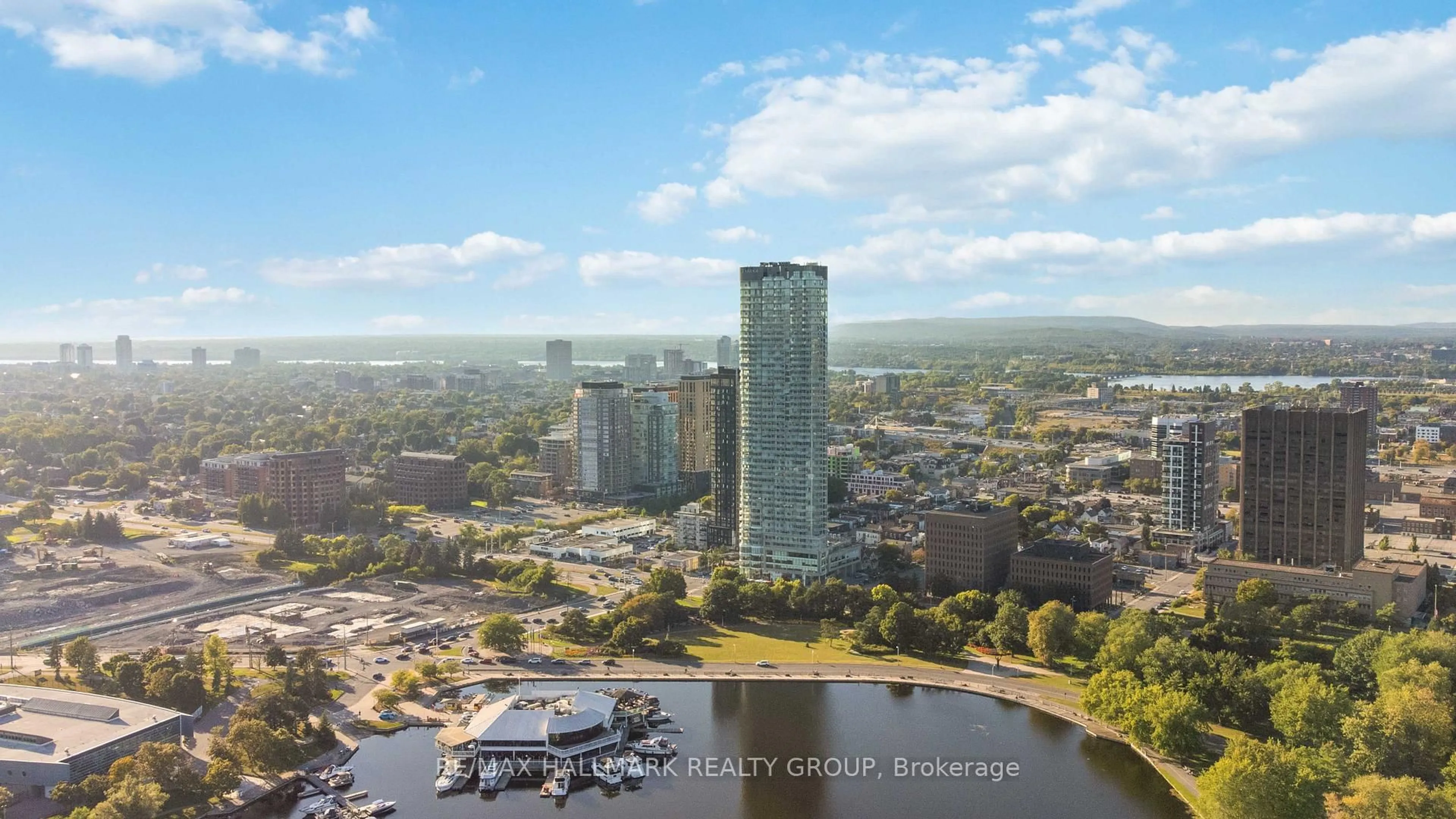 A pic from outside/outdoor area/front of a property/back of a property/a pic from drone, water/lake/river/ocean view for 805 CARLING Ave #2406, Ottawa Ontario K1S 5W9
