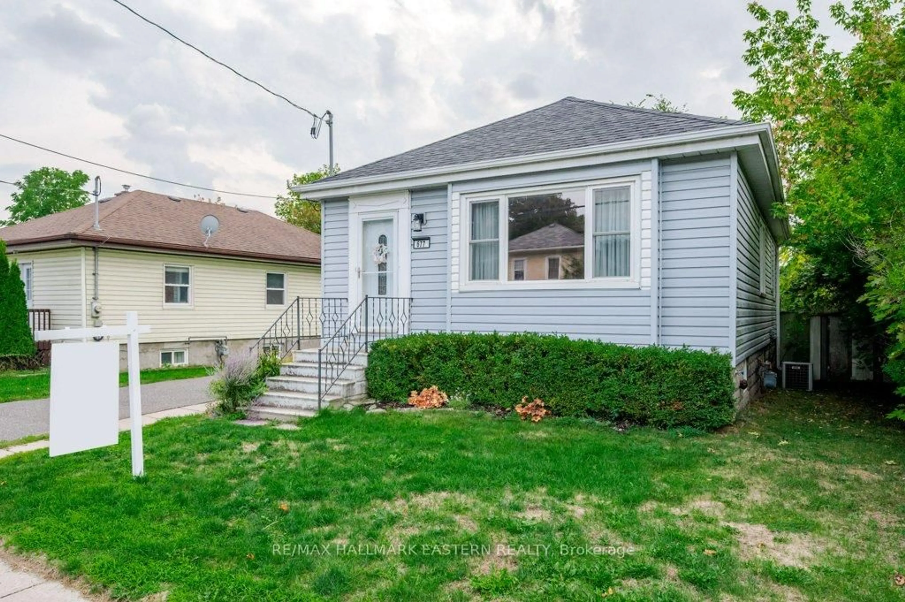 Home with vinyl exterior material, street for 677 Armour Rd, Peterborough Ontario K9H 1Z5