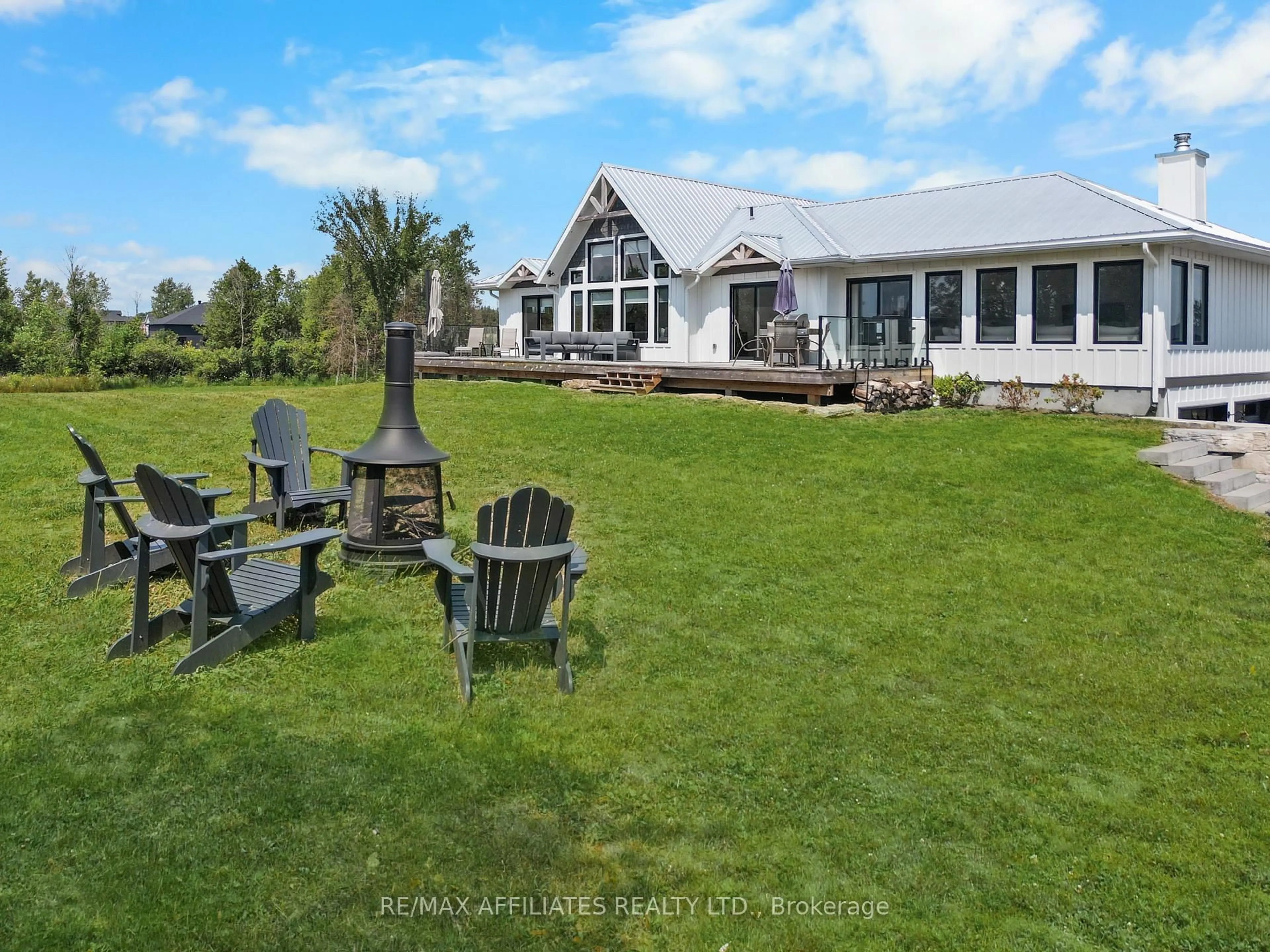 A pic from outside/outdoor area/front of a property/back of a property/a pic from drone, water/lake/river/ocean view for 205 Westar Farm Way, Ashton Ontario K0A 1B0