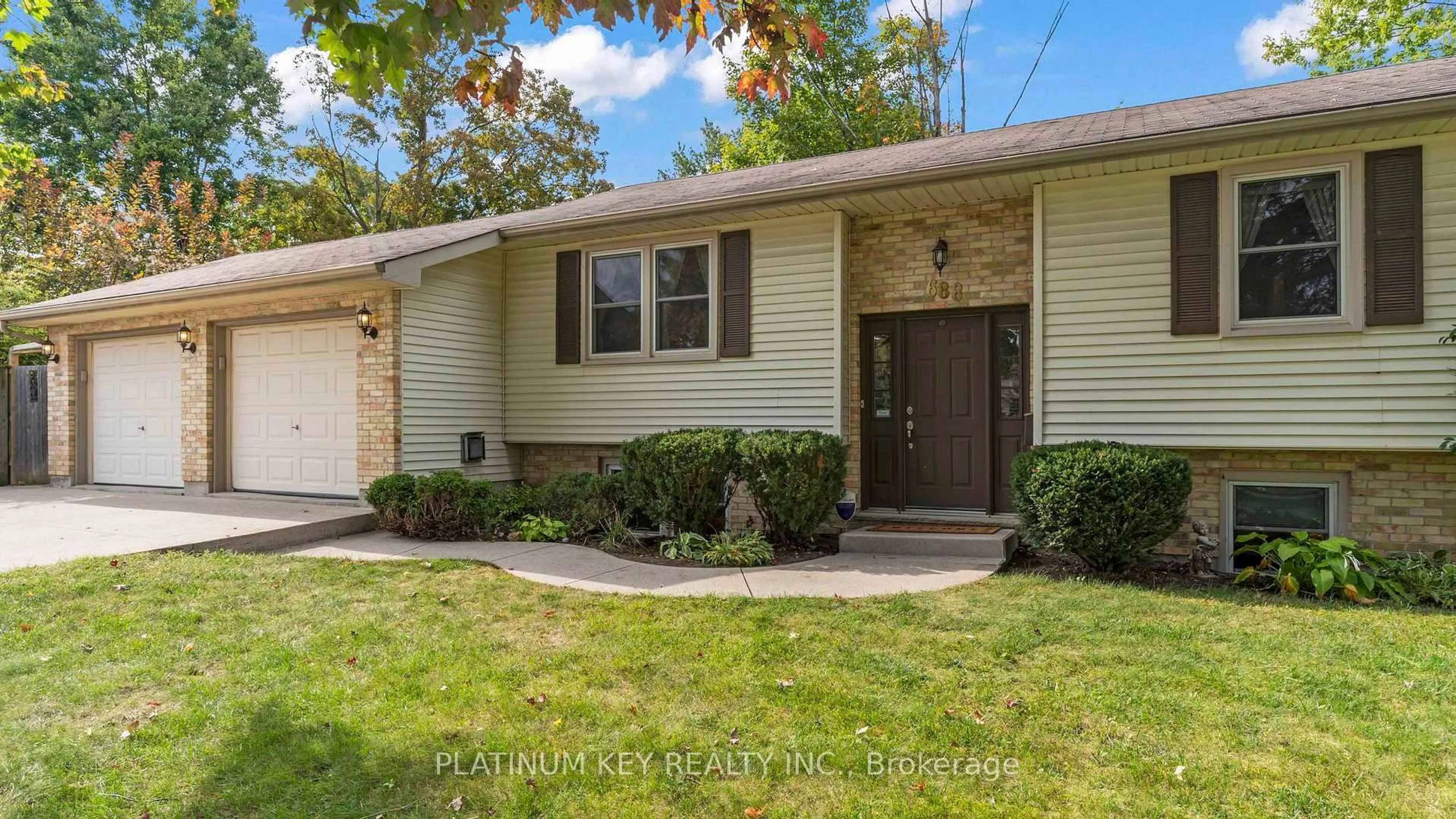 Home with vinyl exterior material, street for 688 John St, Strathroy-Caradoc Ontario N0L 1W0