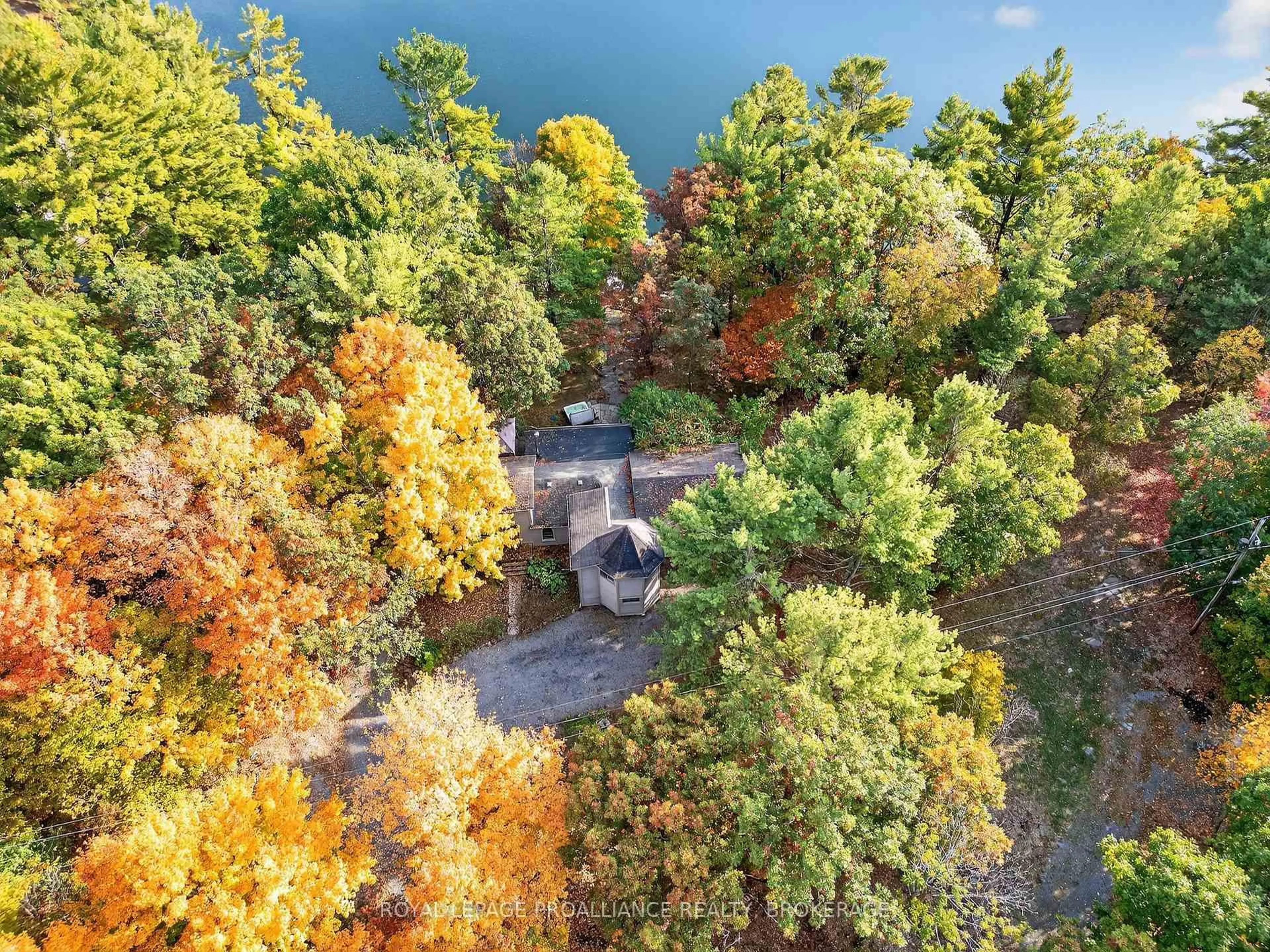 A pic from outside/outdoor area/front of a property/back of a property/a pic from drone, water/lake/river/ocean view for 18 Hickory Lane, Perth Road Ontario K0H 2L0