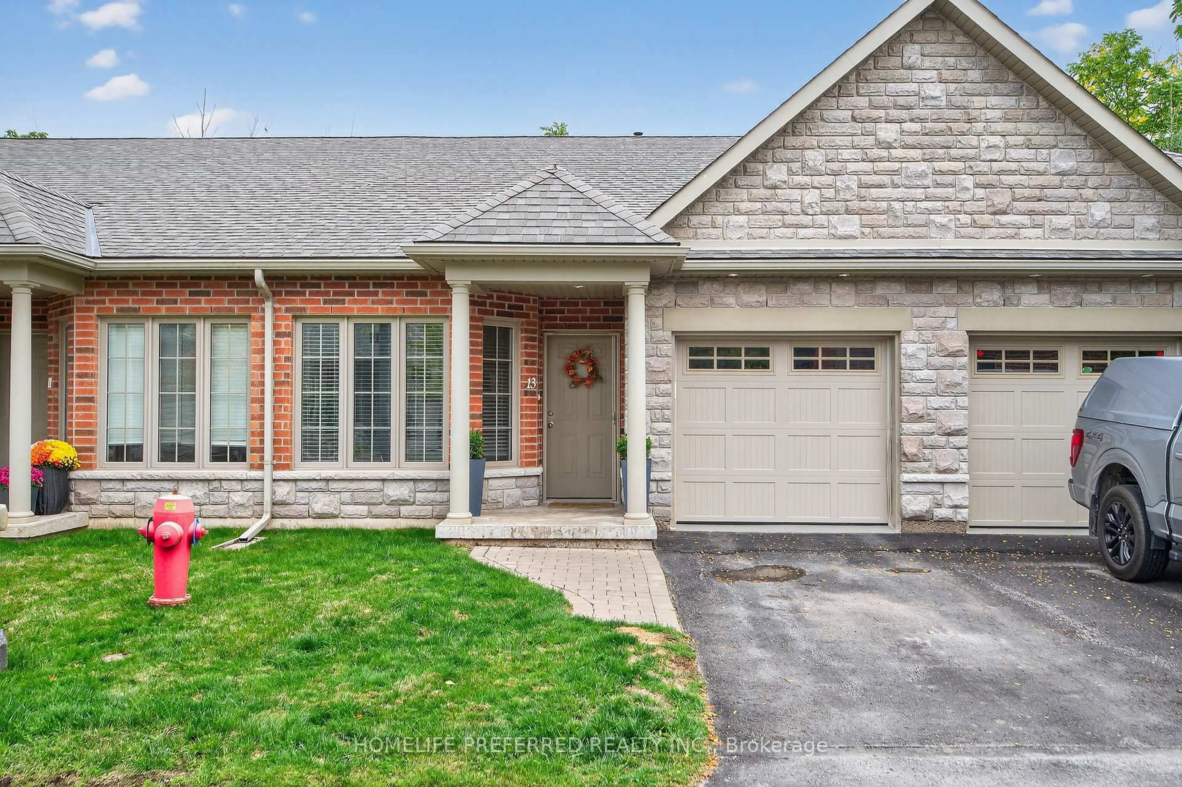 Home with brick exterior material, street for 13 Wingett Way, Selwyn Ontario K0L 2H0