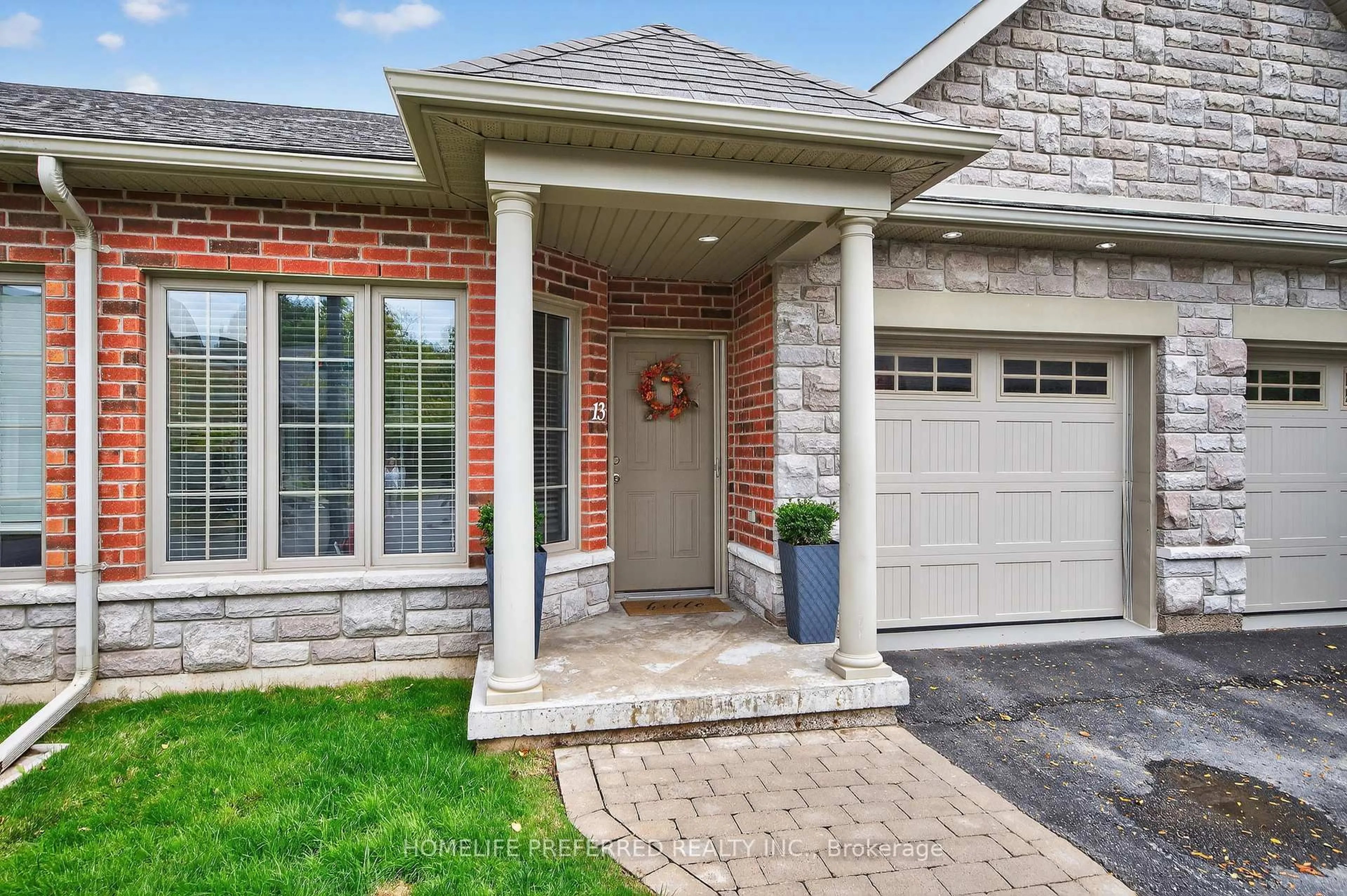Home with brick exterior material, street for 13 Wingett Way, Selwyn Ontario K0L 2H0
