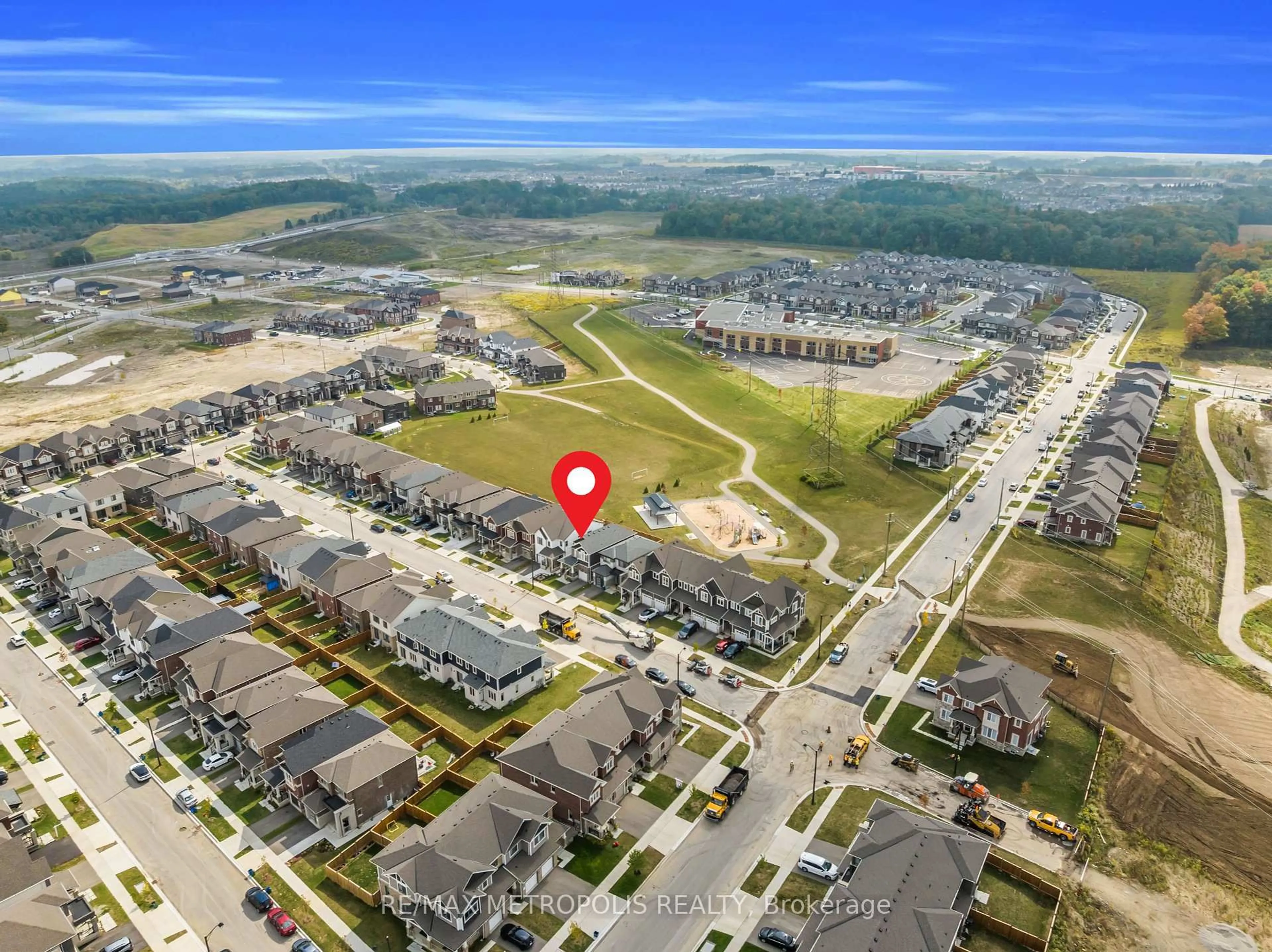 A pic from outside/outdoor area/front of a property/back of a property/a pic from drone, street for 18 Saxony St, Kitchener Ontario N2R 0S3