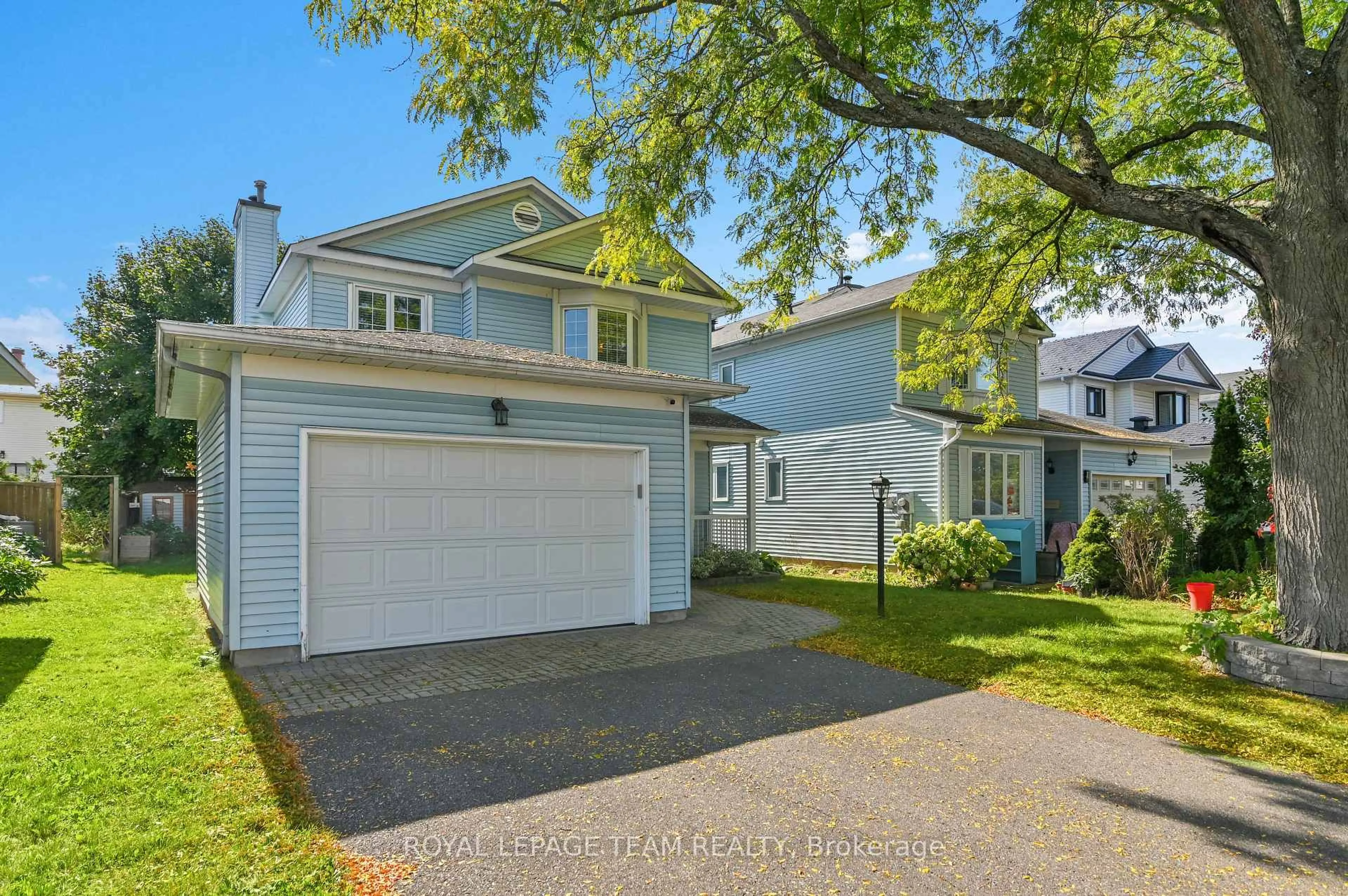 Home with vinyl exterior material, street for 310 McEachern Cres, Orleans Ontario K1E 3K2