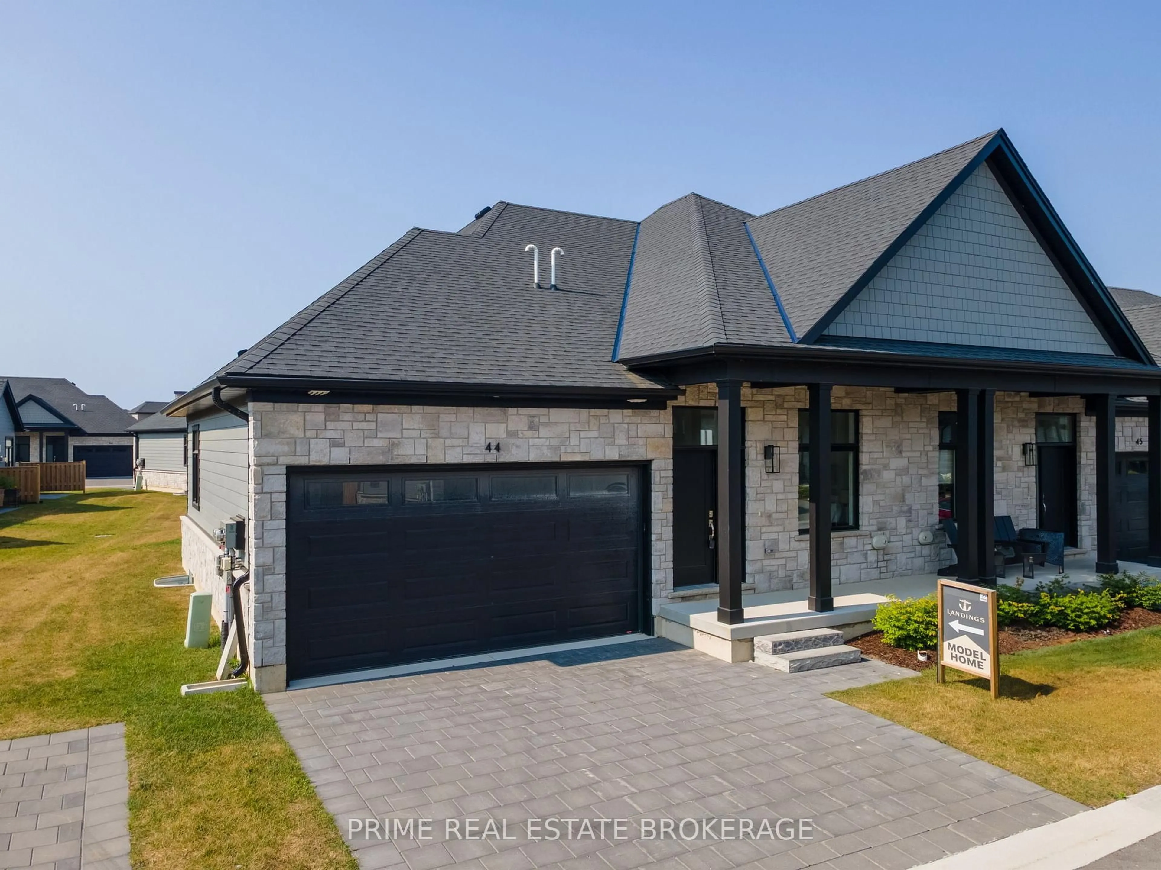 Home with brick exterior material, street for 63 Compass Tr #44, Central Elgin Ontario N5L 0B4