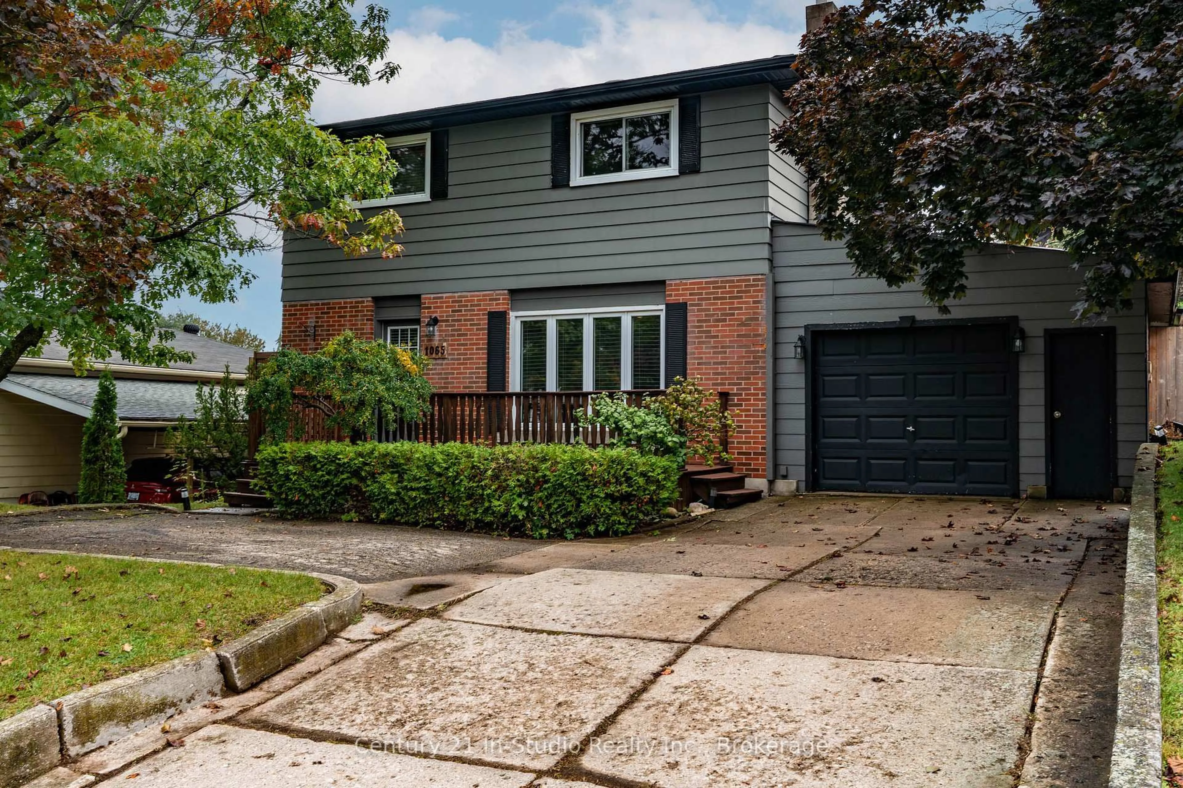 Home with brick exterior material, street for 1065 10th Ave, Owen Sound Ontario N4K 3H9