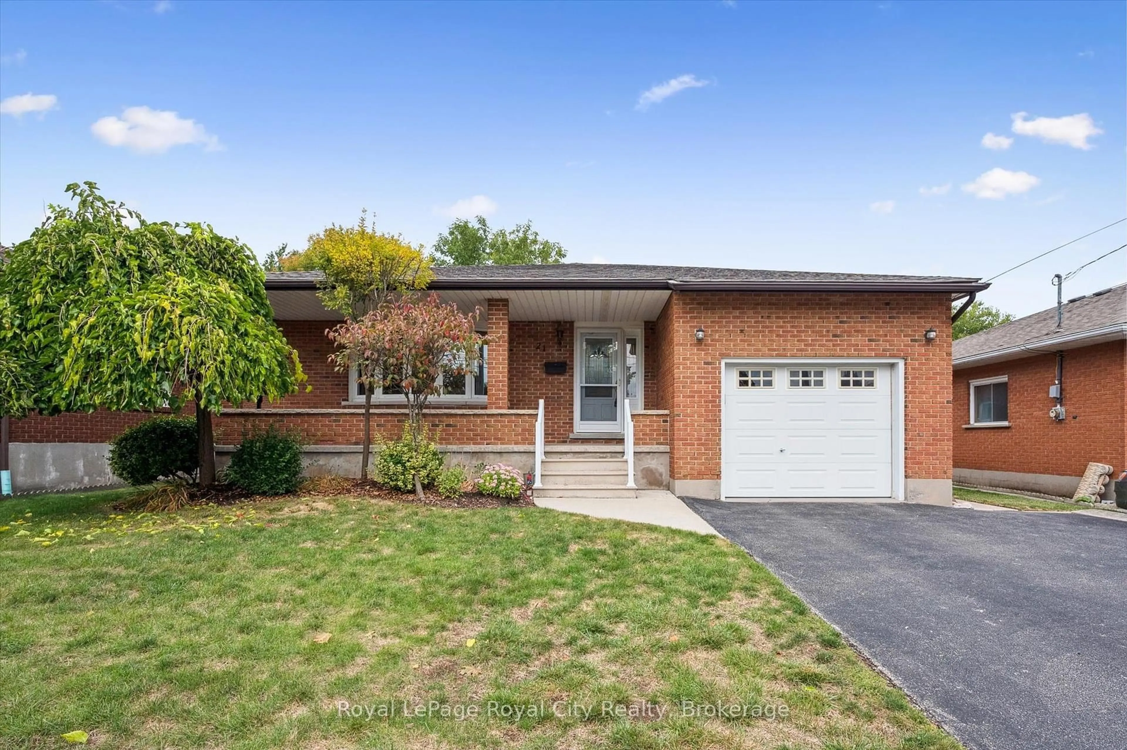 Home with brick exterior material, street for 21 Heath Rd, Guelph Ontario N1H 6G8