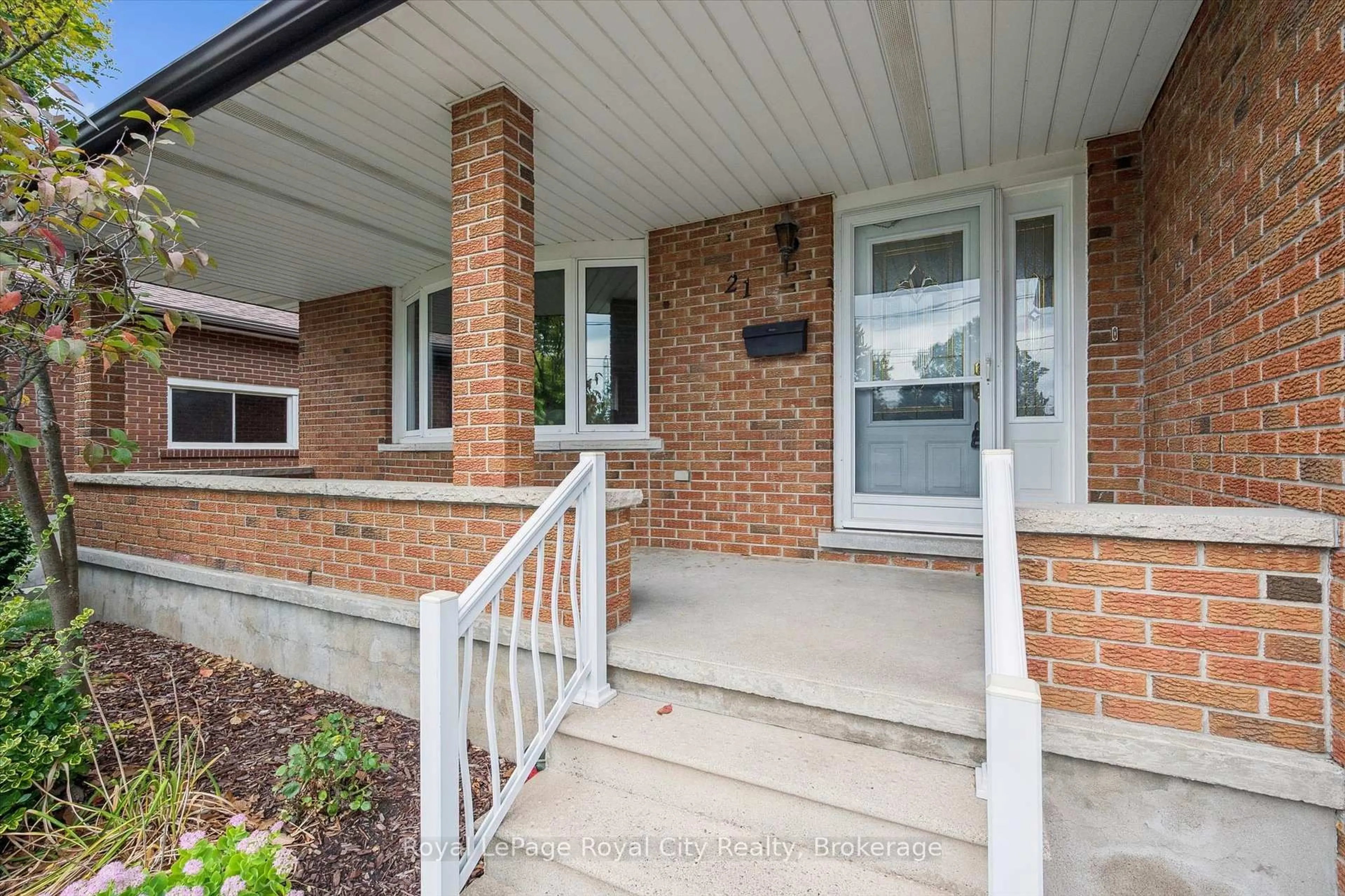 Home with brick exterior material, street for 21 Heath Rd, Guelph Ontario N1H 6G8