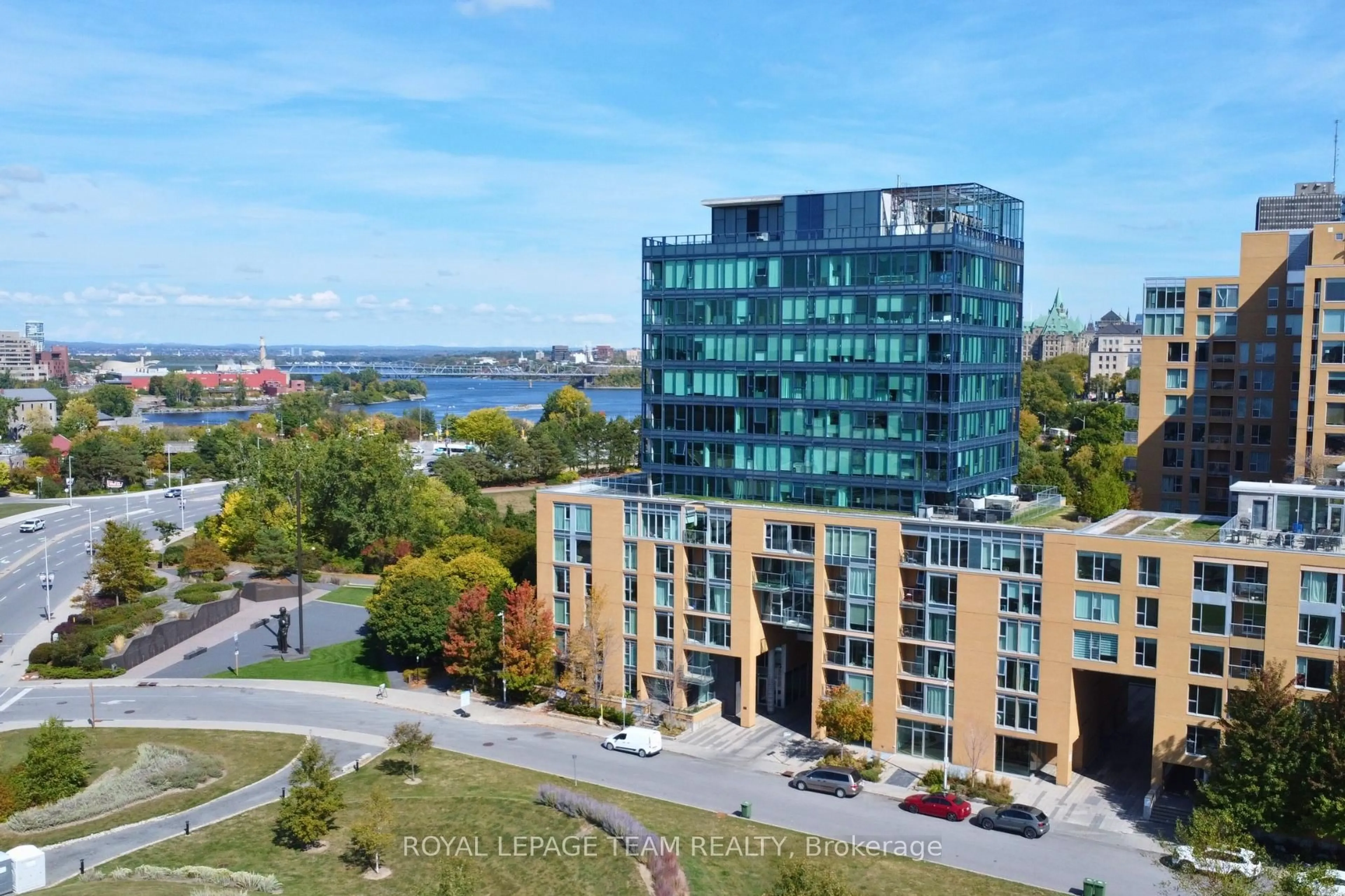 A pic from outside/outdoor area/front of a property/back of a property/a pic from drone, city buildings view from balcony for 200 Lett St #406, Ottawa Ontario K1R 0A7
