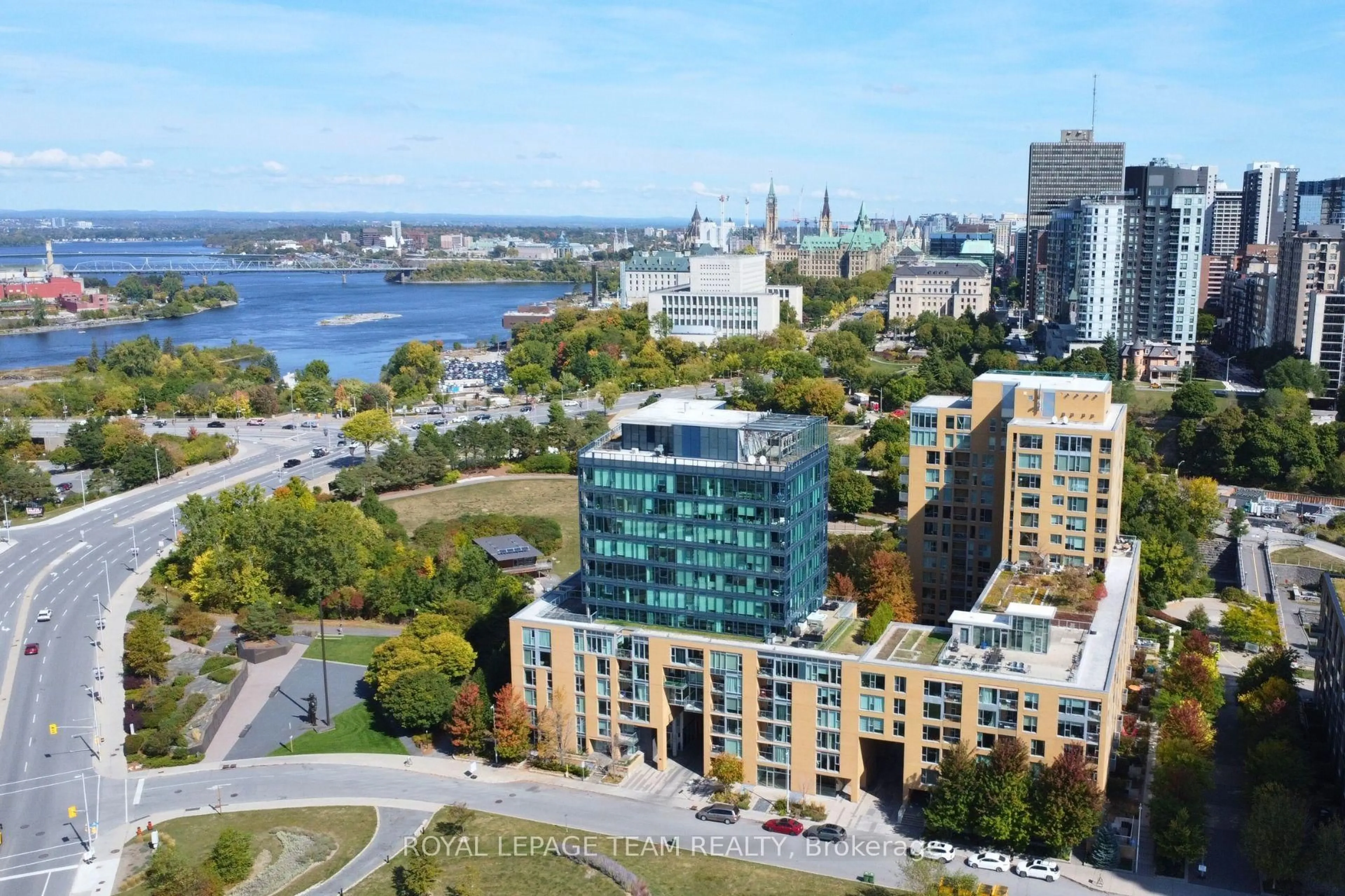 A pic from outside/outdoor area/front of a property/back of a property/a pic from drone, city buildings view from balcony for 200 Lett St #406, Ottawa Ontario K1R 0A7