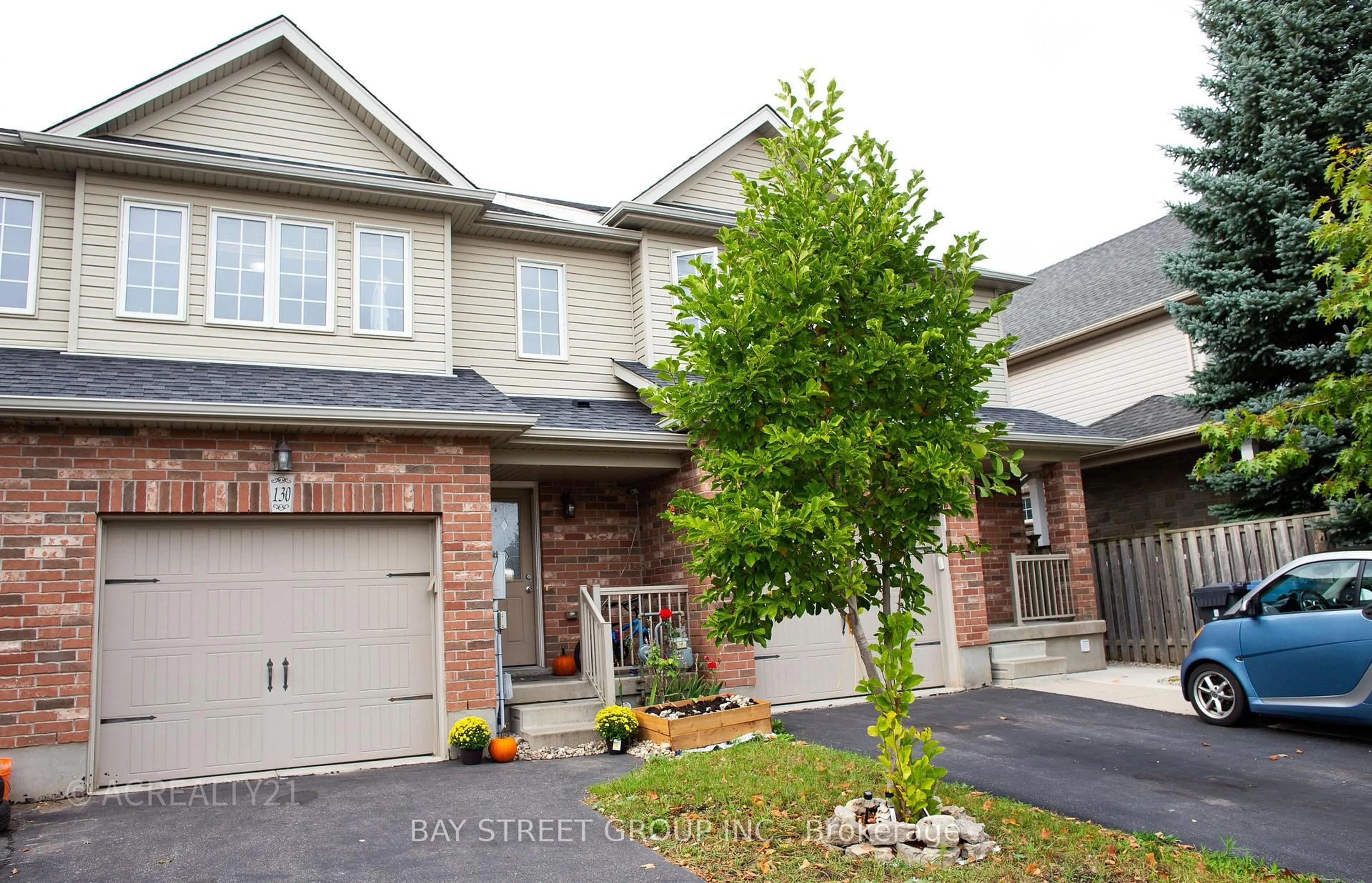Home with brick exterior material, street for 130 Simmonds Dr, Guelph Ontario N1E 7L8