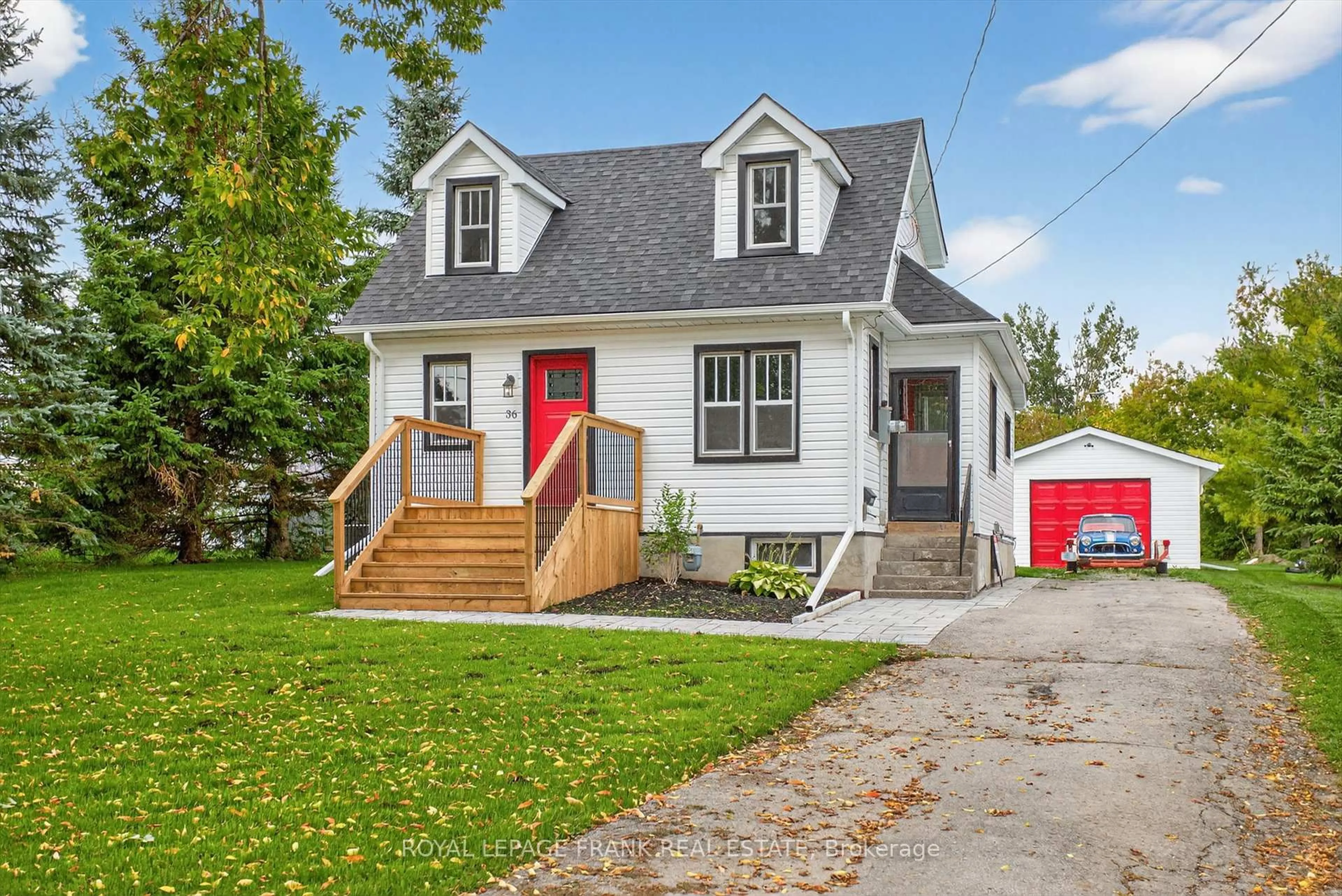 Home with vinyl exterior material, street for 36 George St, Kawartha Lakes Ontario K9V 1W5