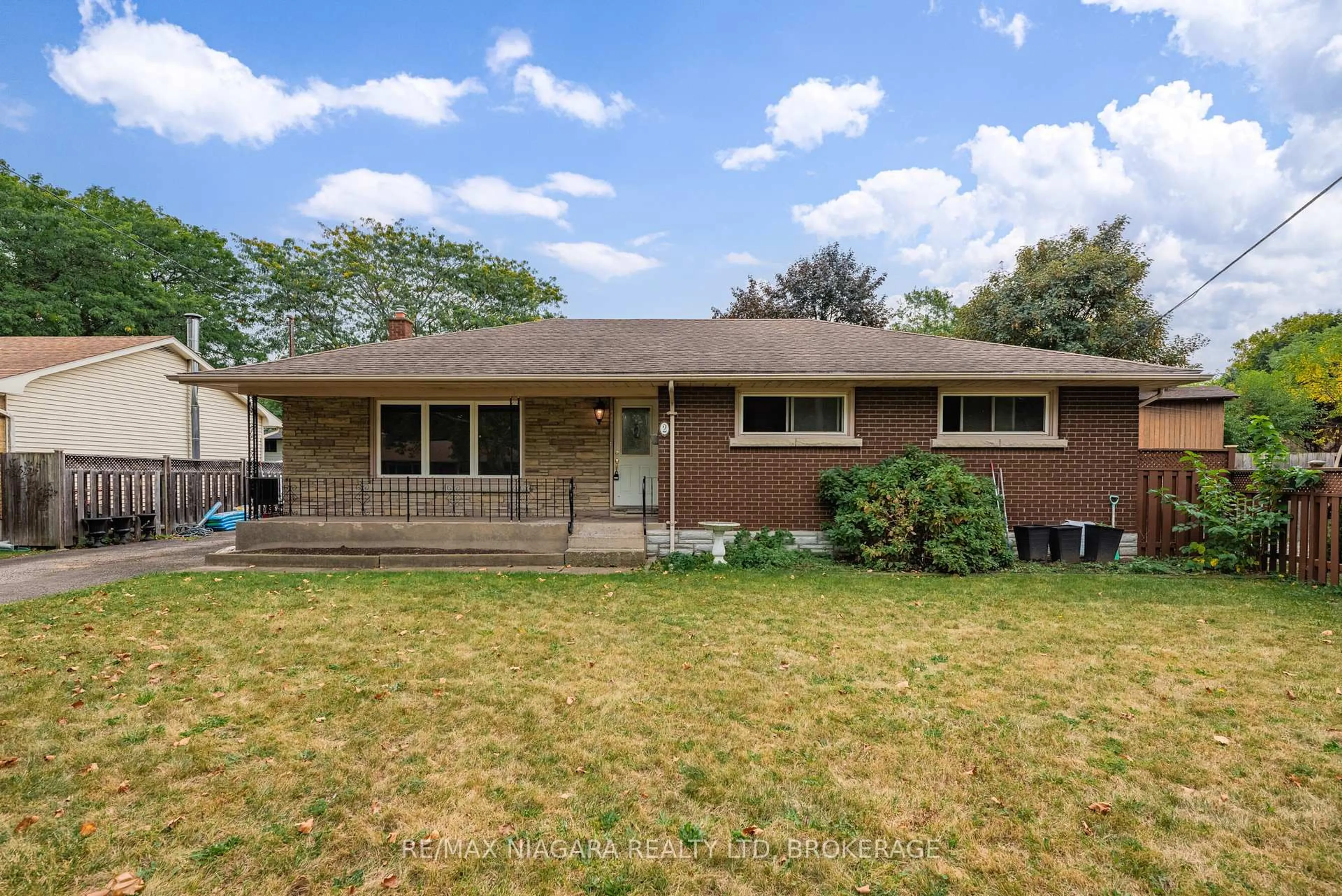 Home with brick exterior material, street for 2 Harper St, St. Catharines Ontario L2M 2X3