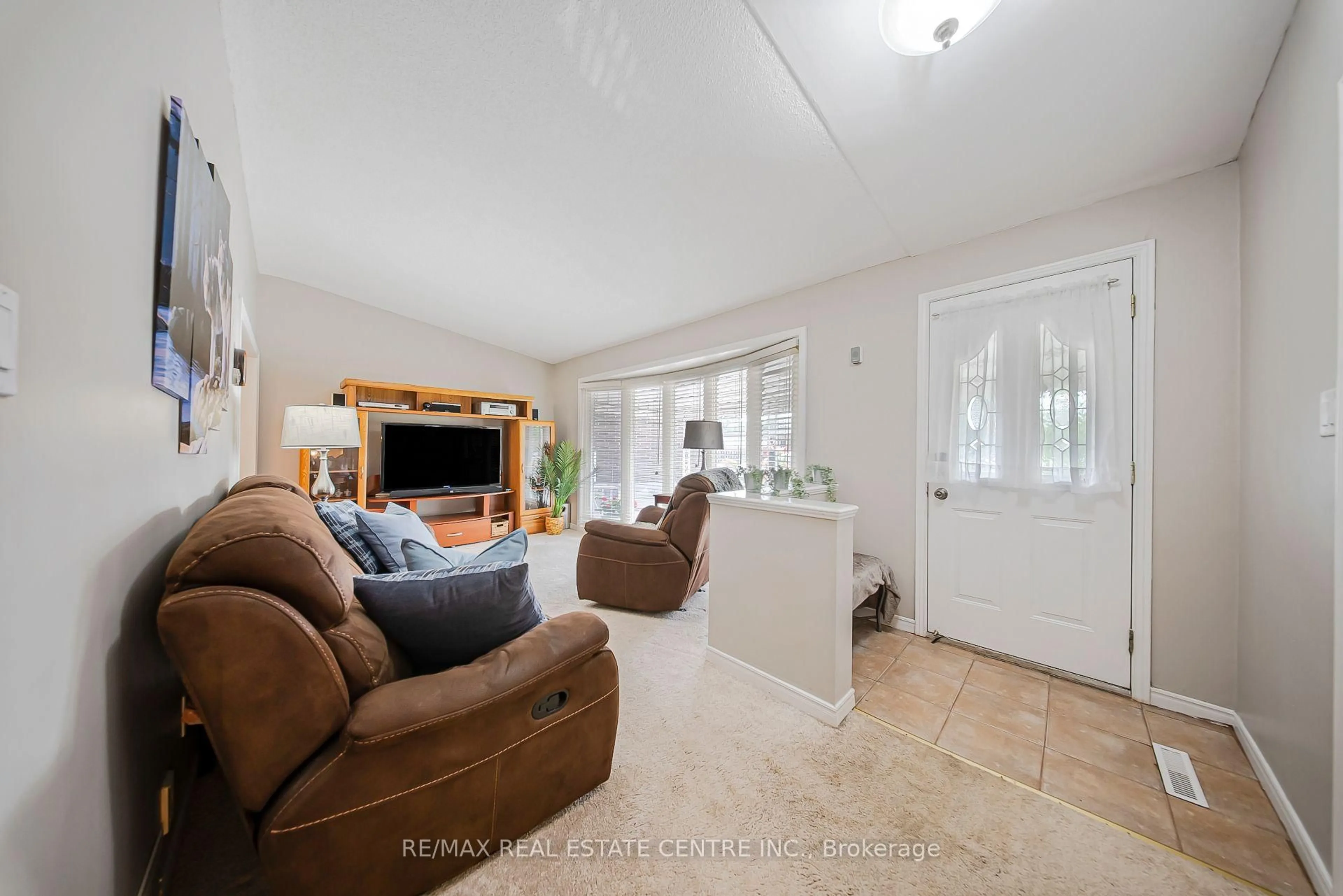 Living room with furniture, unknown for 23 Coral Dr, Hamilton Ontario L8V 2N4