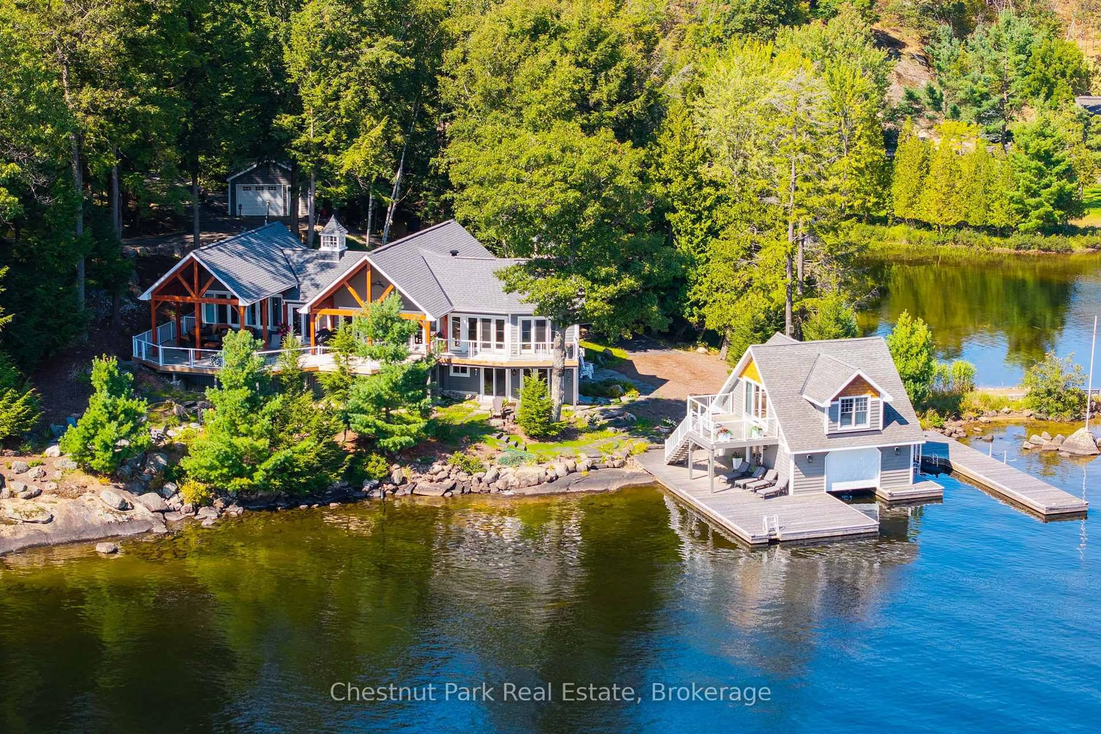 A pic from outside/outdoor area/front of a property/back of a property/a pic from drone, water/lake/river/ocean view for 1092 Scarcliffe Rd #7, Muskoka Lakes Ontario P0B 1J0