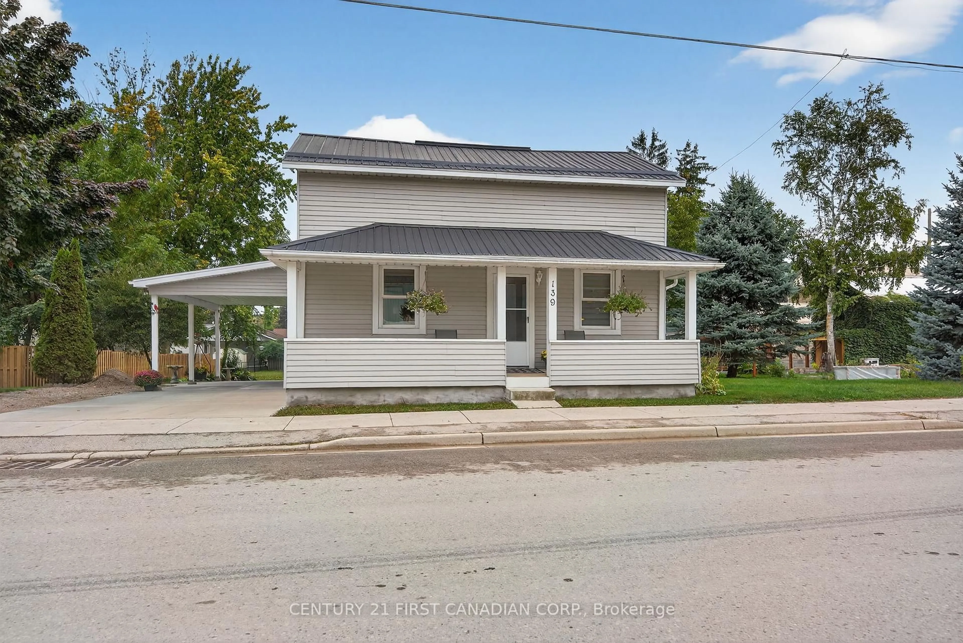 A pic from outside/outdoor area/front of a property/back of a property/a pic from drone, street for 139 Centre St, South Huron Ontario N0M 1N0
