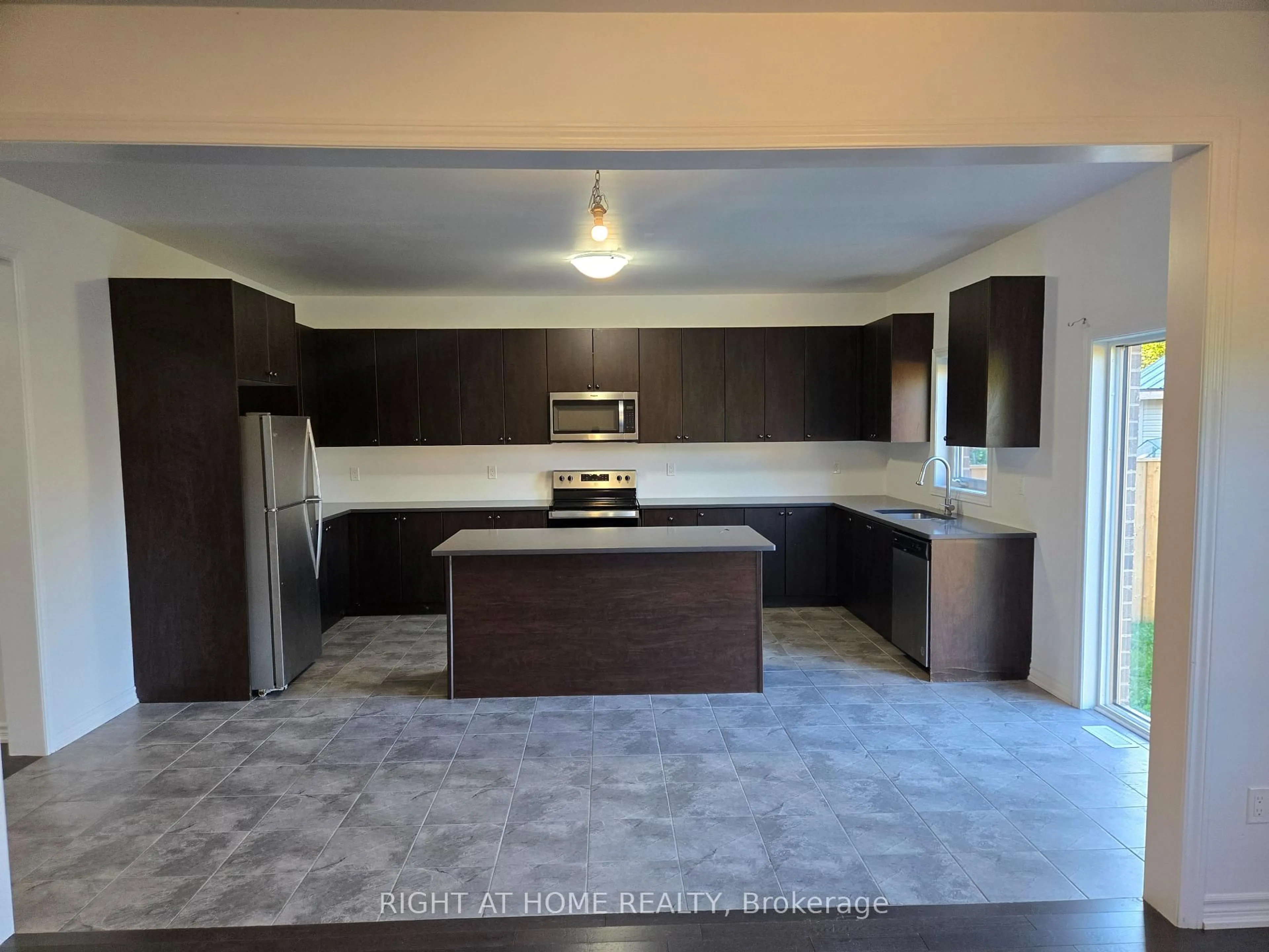 Open concept kitchen, ceramic/tile floor for 265 Ridley Cres, Southgate Ontario N0C 1B0