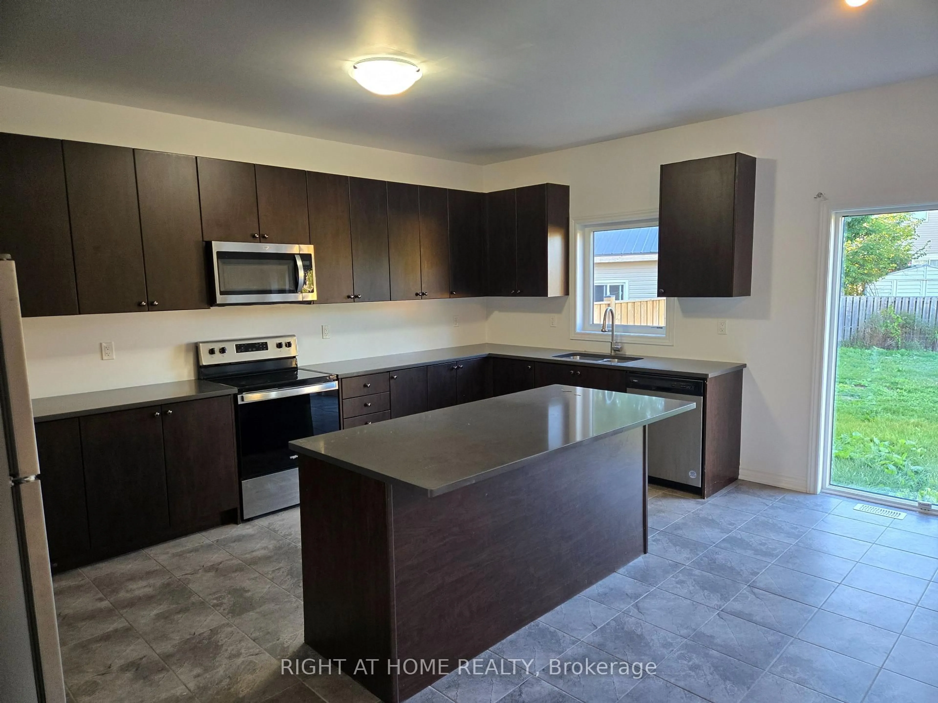 Open concept kitchen, ceramic/tile floor for 265 Ridley Cres, Southgate Ontario N0C 1B0