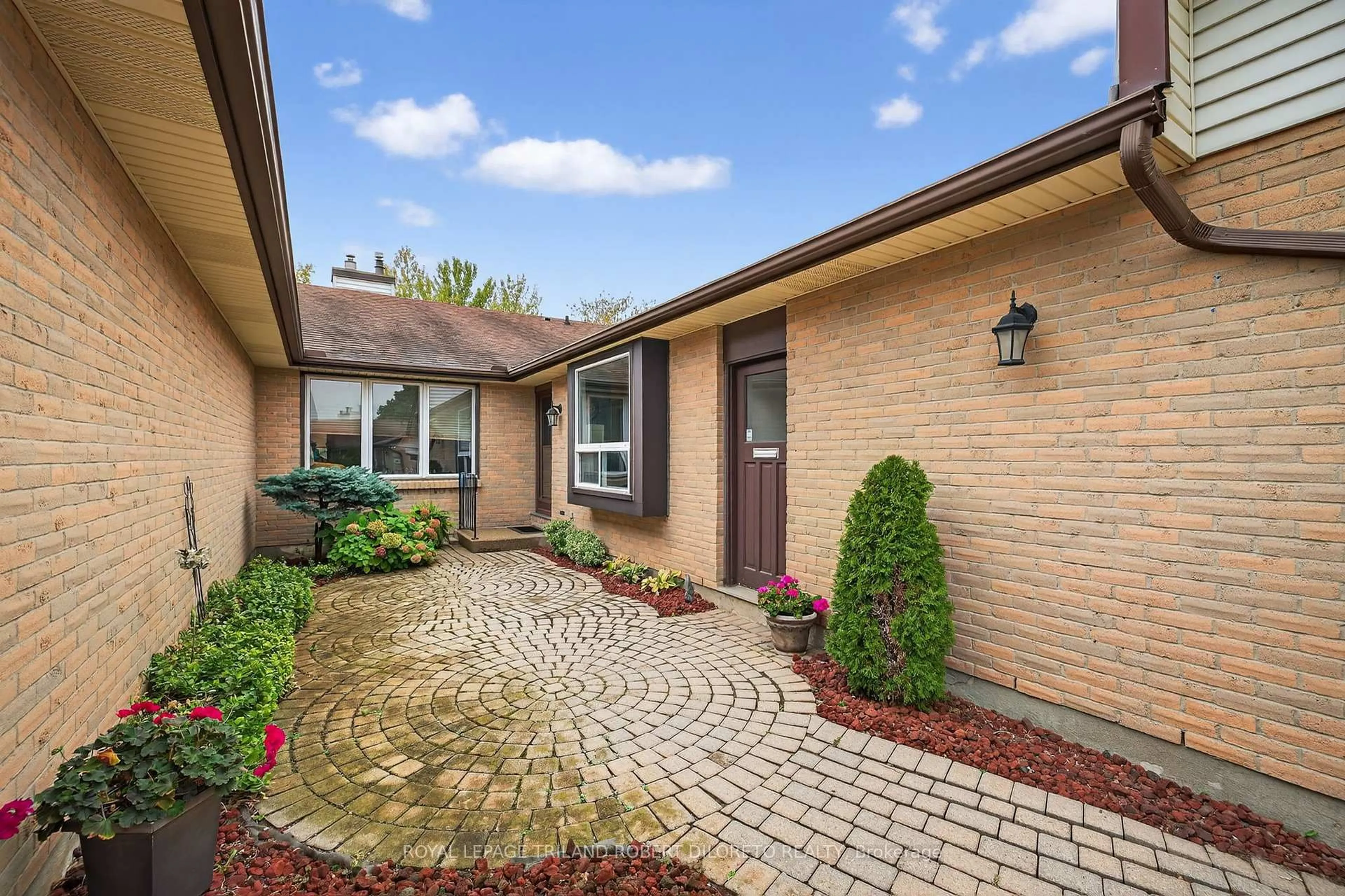 Home with brick exterior material, street for 60 Fiddlers Green Rd #4, London North Ontario N6H 4S7