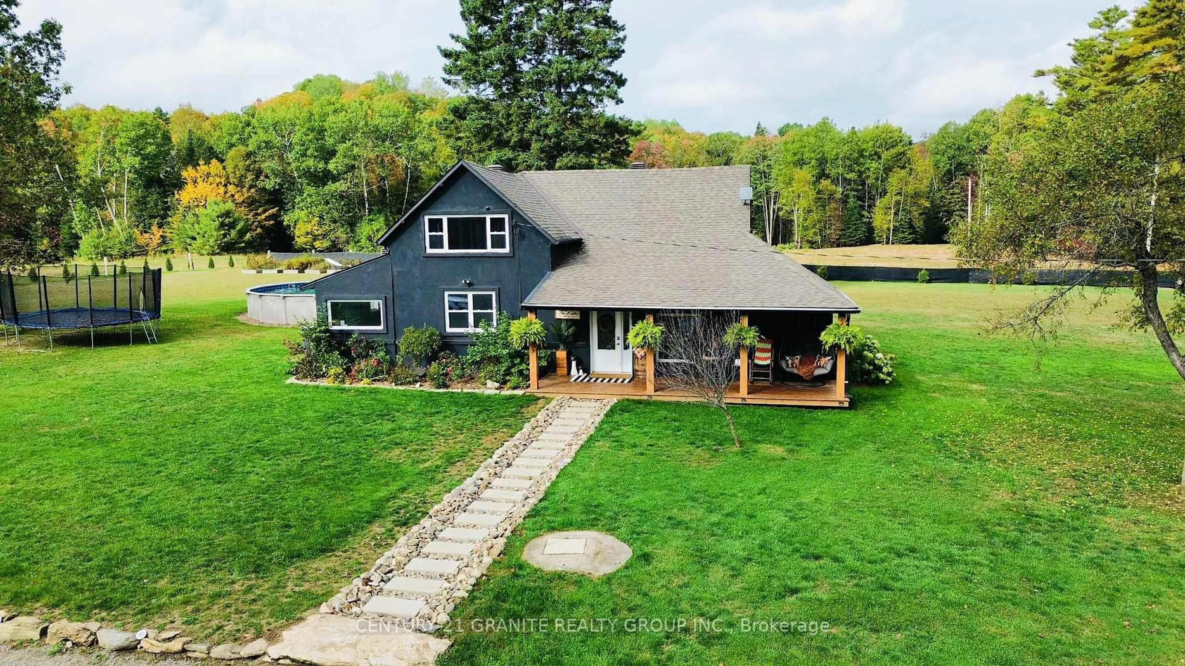 A pic from outside/outdoor area/front of a property/back of a property/a pic from drone, water/lake/river/ocean view for 1221 Bay Lake Rd, Bancroft Ontario K0L 1C0